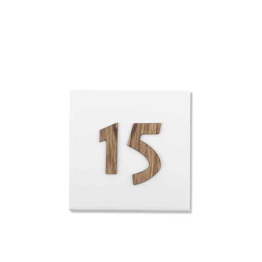White concrete house entrance sign with wooden lettering - Family series