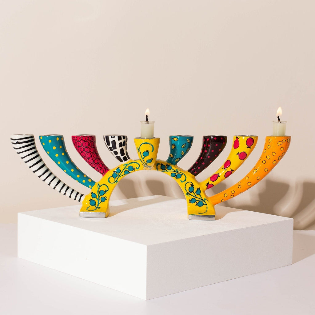 A luxurious and functional menorah – that easily transforms into a designer Candleholder– Twist series