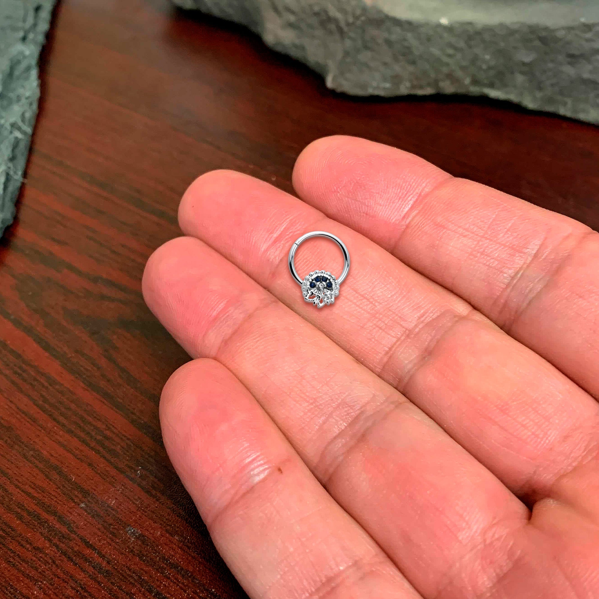 16G 3/8 Clear Blue Gem Abstract Arch Hinged Segment Ring