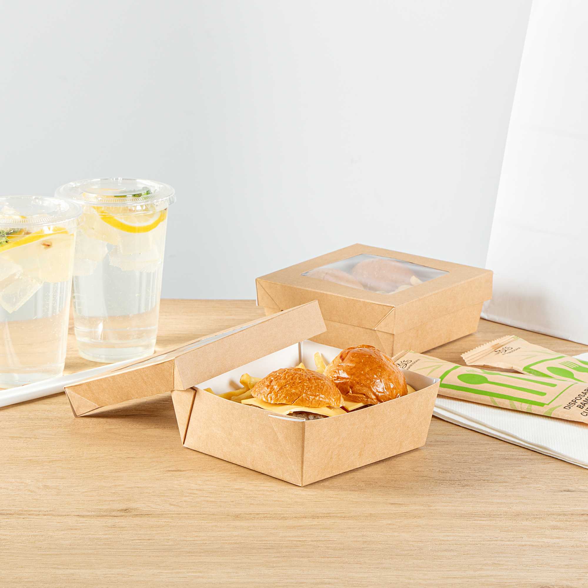 Cafe Vision 27 oz Square Kraft Paper Medium Take Out Container - 5 1/4" x 5 1/4" x 2" - 25 count box