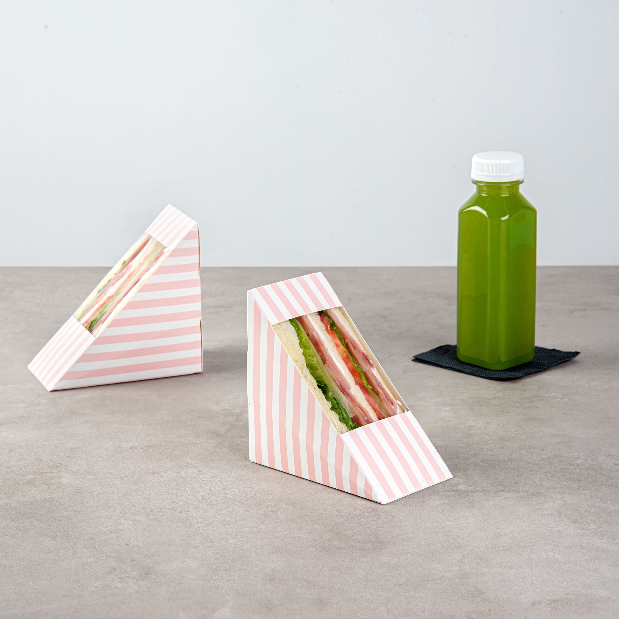 Cafe Vision Triangle Pink and White Stripe Paper Medium Sandwich Box - 4 3/4" x 4 3/4" x 2 3/4" - 25 count box