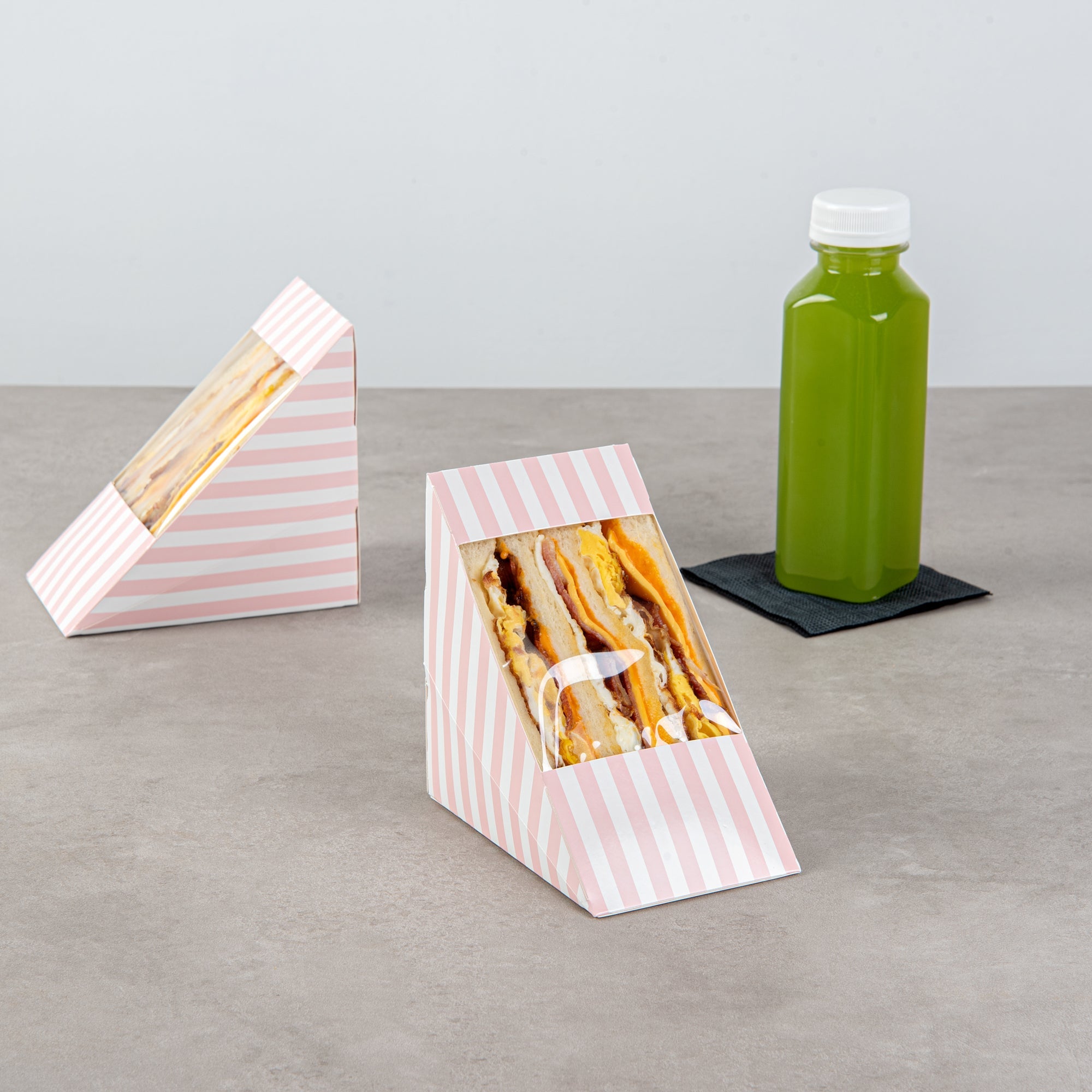 Cafe Vision Triangle Pink and White Stripe Paper Large Sandwich Box - 4 3/4" x 4 3/4" x 3 1/4" - 25 count box