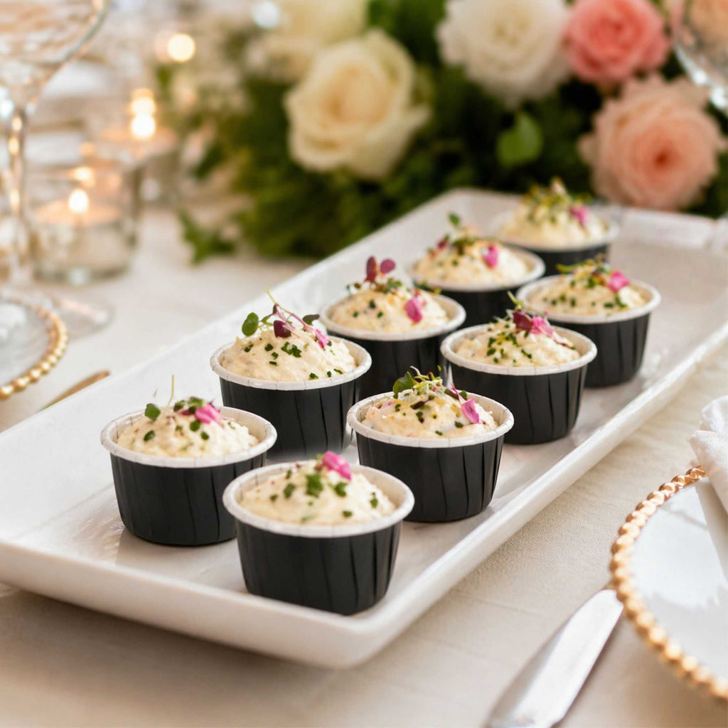 Panificio 1 oz Round Black Paper Small Baking Cup - Pleated - 2" x 2" x 1 1/4" - 200 count box