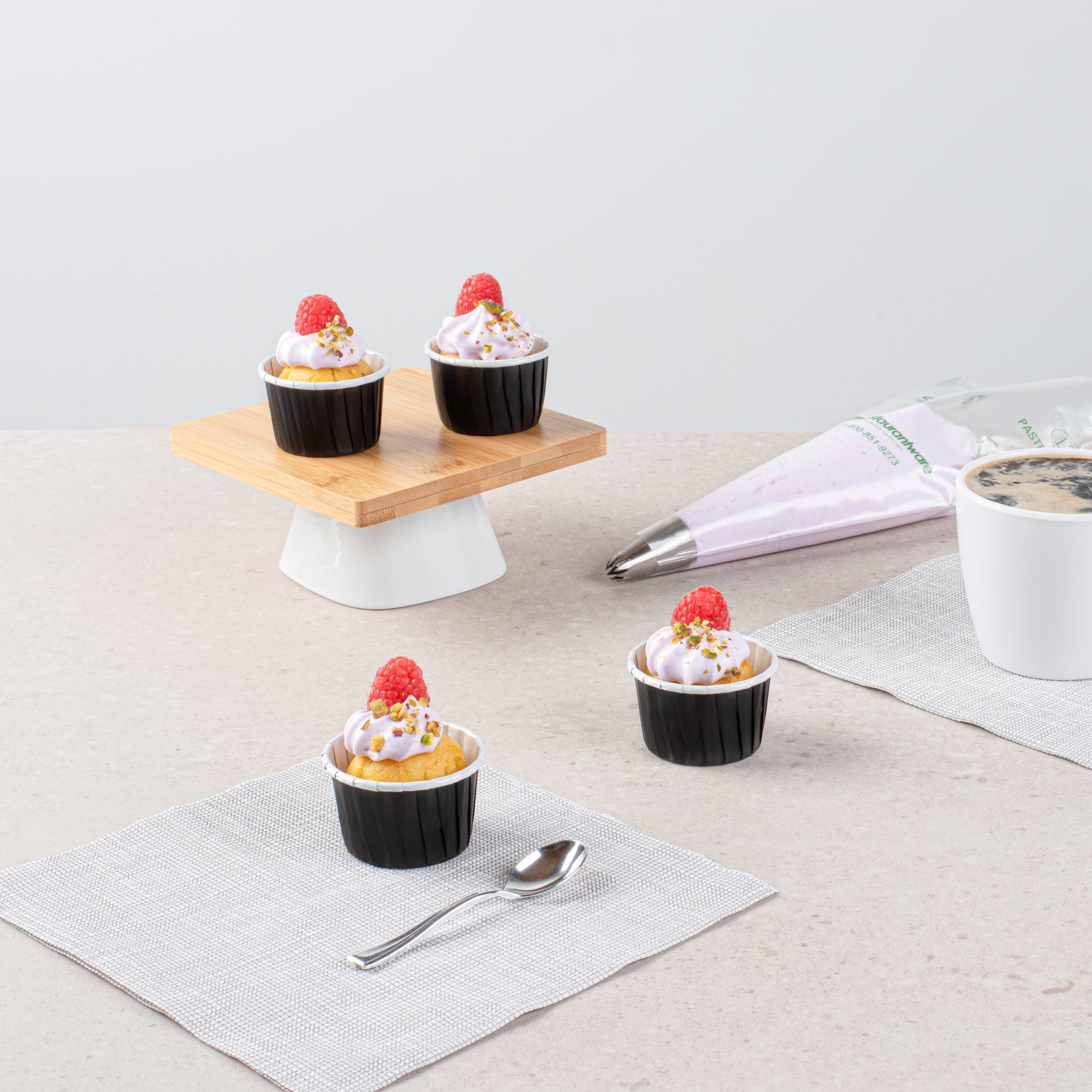 Panificio 2 oz Round Black Paper Medium Baking Cup - Pleated - 2 1/4" x 2 1/4" x 1 1/2" - 200 count box