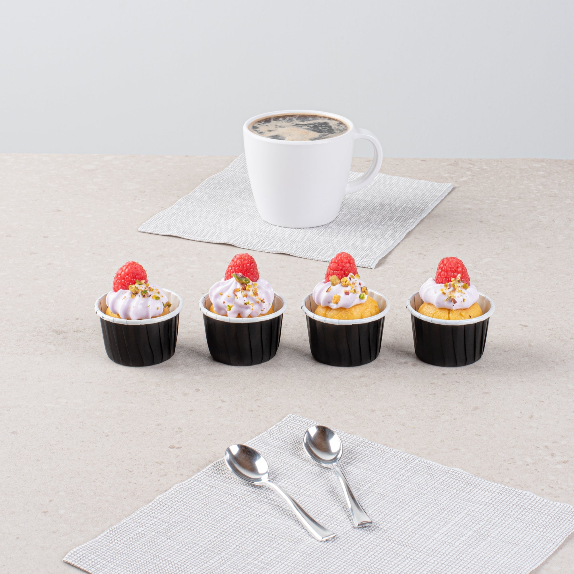 Panificio 2 oz Round Black Paper Medium Baking Cup - Pleated - 2 1/4" x 2 1/4" x 1 1/2" - 200 count box