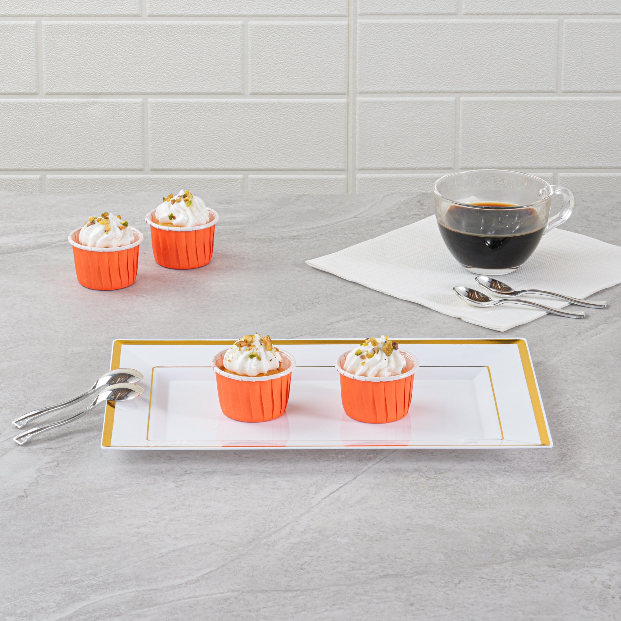 Panificio 2 oz Round Tangerine Orange Paper Medium Baking Cup - Pleated - 2 1/4" x 2 1/4" x 1 1/2" - 200 count box