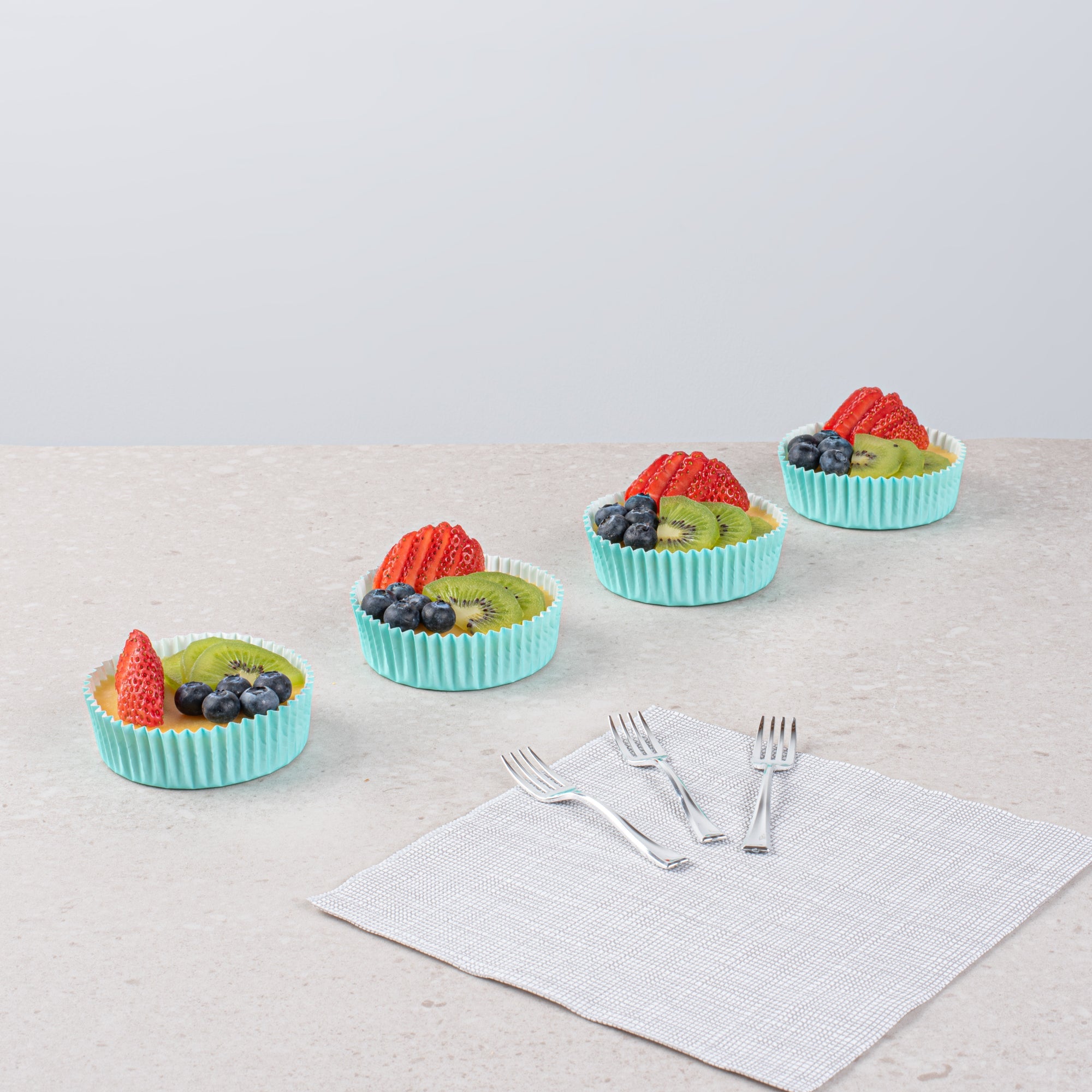 Panificio 4 oz Round Turquoise Paper Baking Cup - Ridged - 3 1/2" x 3 1/2" x 1" - 200 count box