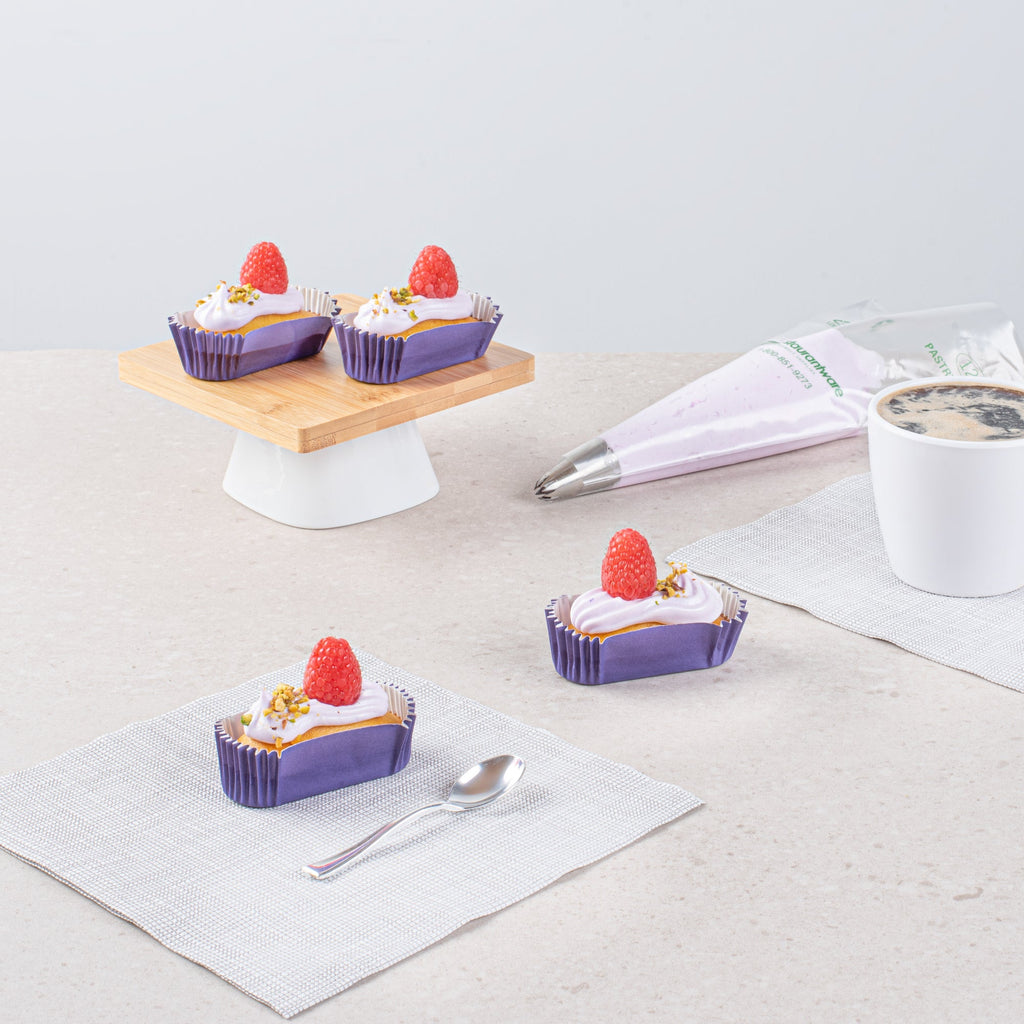 Panificio 1 oz Elliptical Purple Paper Regular Baking Cup - Ridged - 3 1/2" x 1 1/2" x 3/4" - 200 count box
