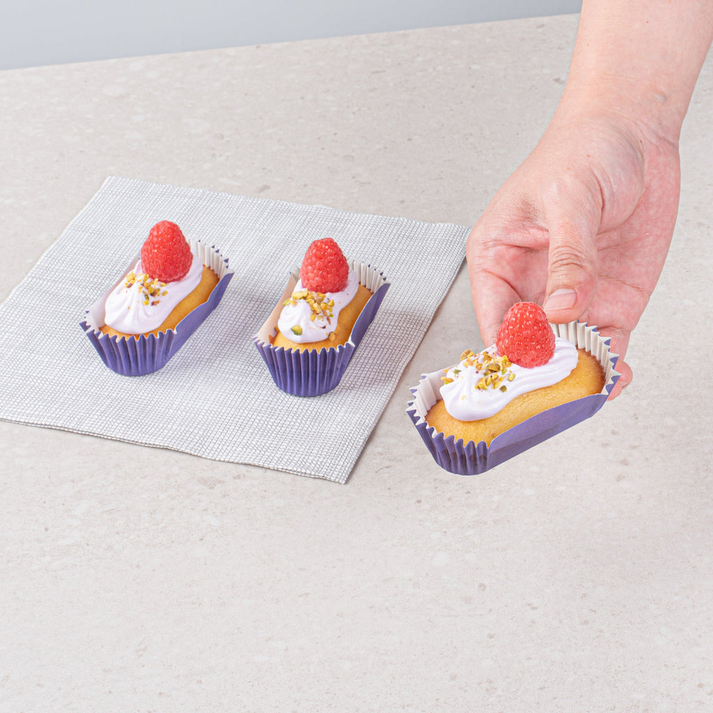 Panificio 1 oz Elliptical Purple Paper Regular Baking Cup - Ridged - 3 1/2" x 1 1/2" x 3/4" - 200 count box