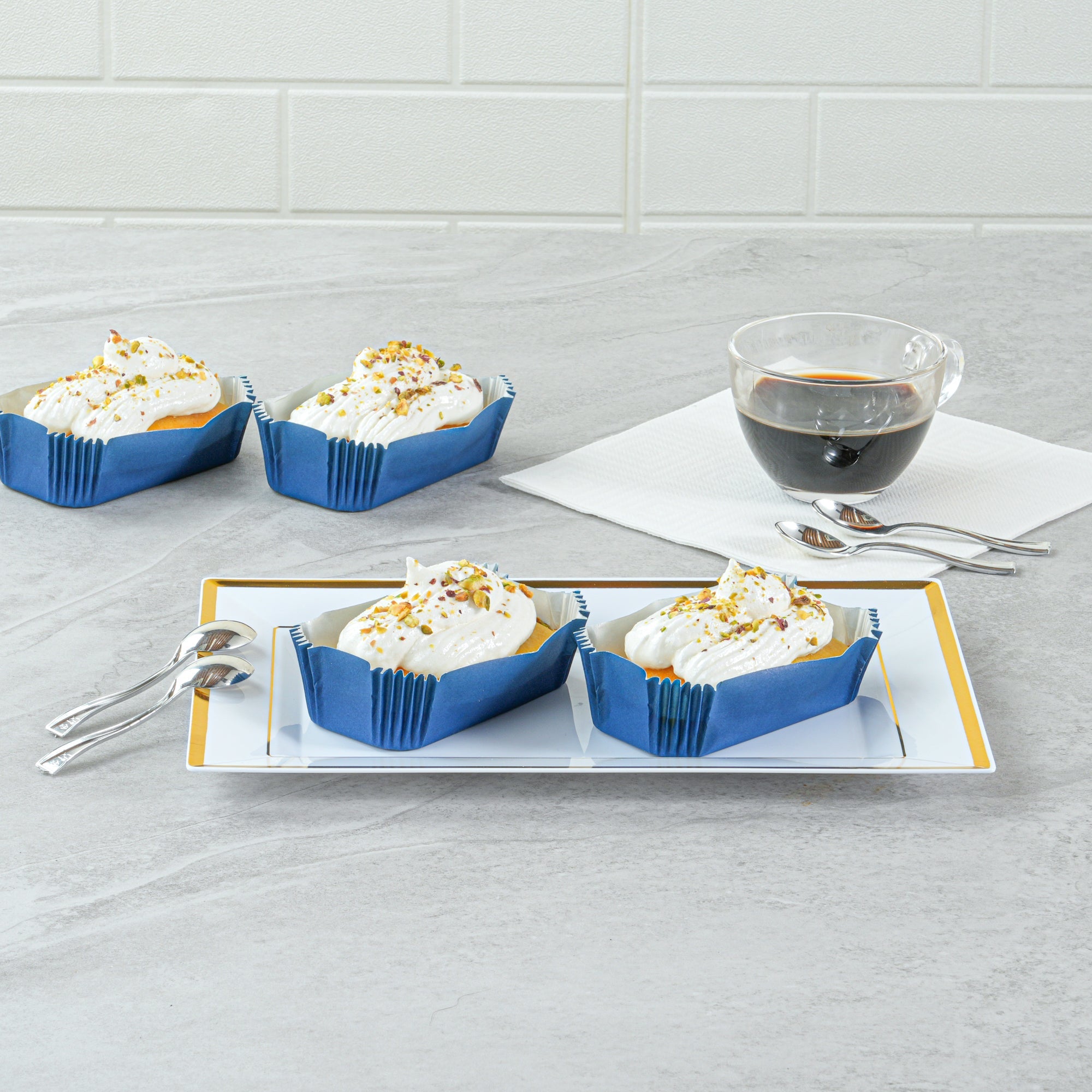 Panificio 5 oz Elliptical Midnight Blue Paper Large Baking Cup - Ridged - 4 1/2" x 2 1/2" x 1 1/4" - 200 count box