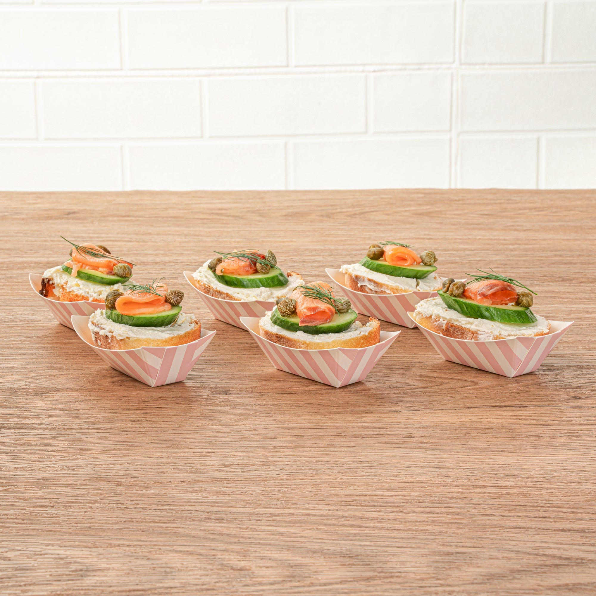 Bio Tek 2 oz Pink and White Stripe Paper Food Tray / Boat - 3 1/4" x 2 1/4" x 1 1/4" - 50 count box