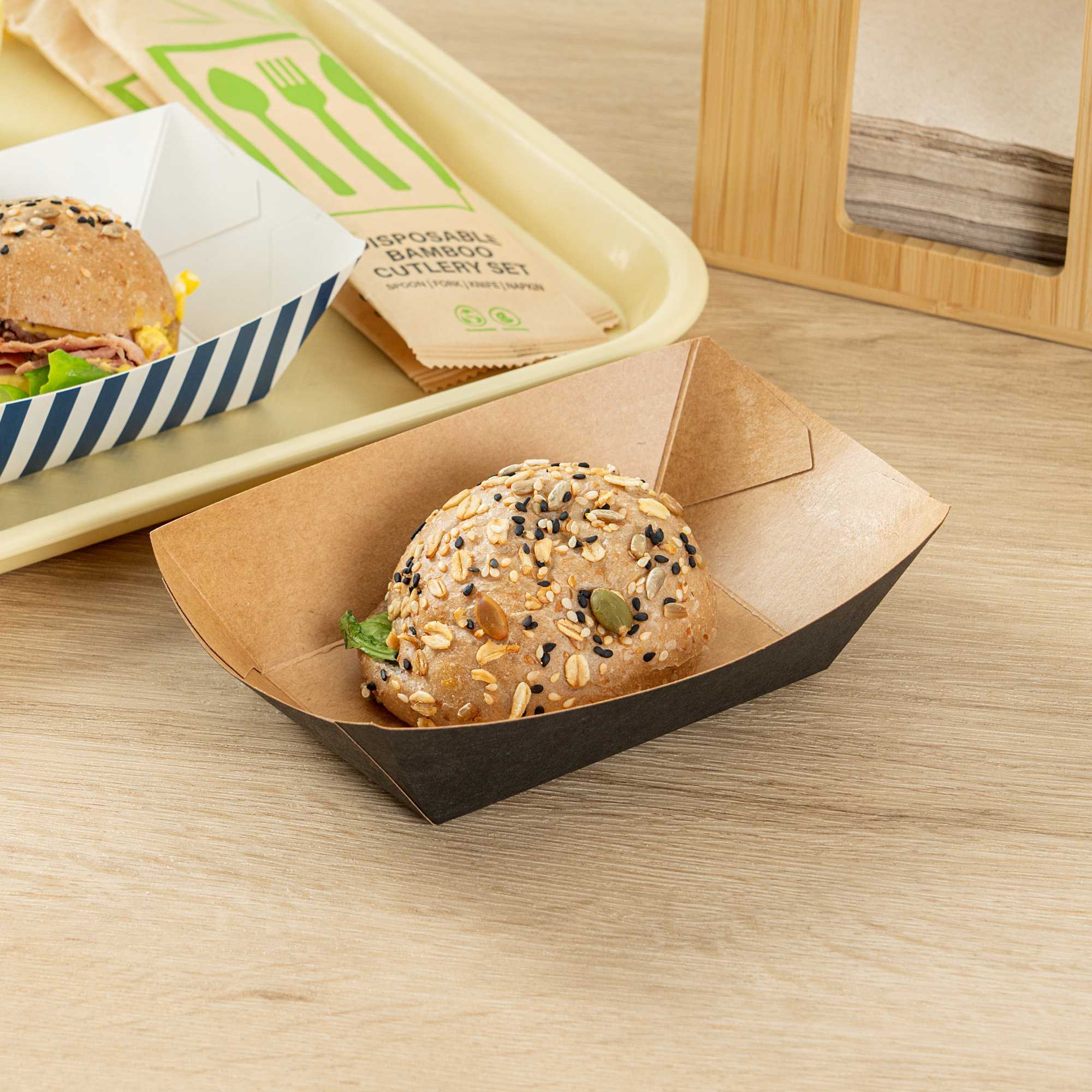 Bio Tek 1/2 lb Black Paper #50 Food Tray / Boat - 4 1/4" x 2 3/4" x 1 1/2" - 400 count box