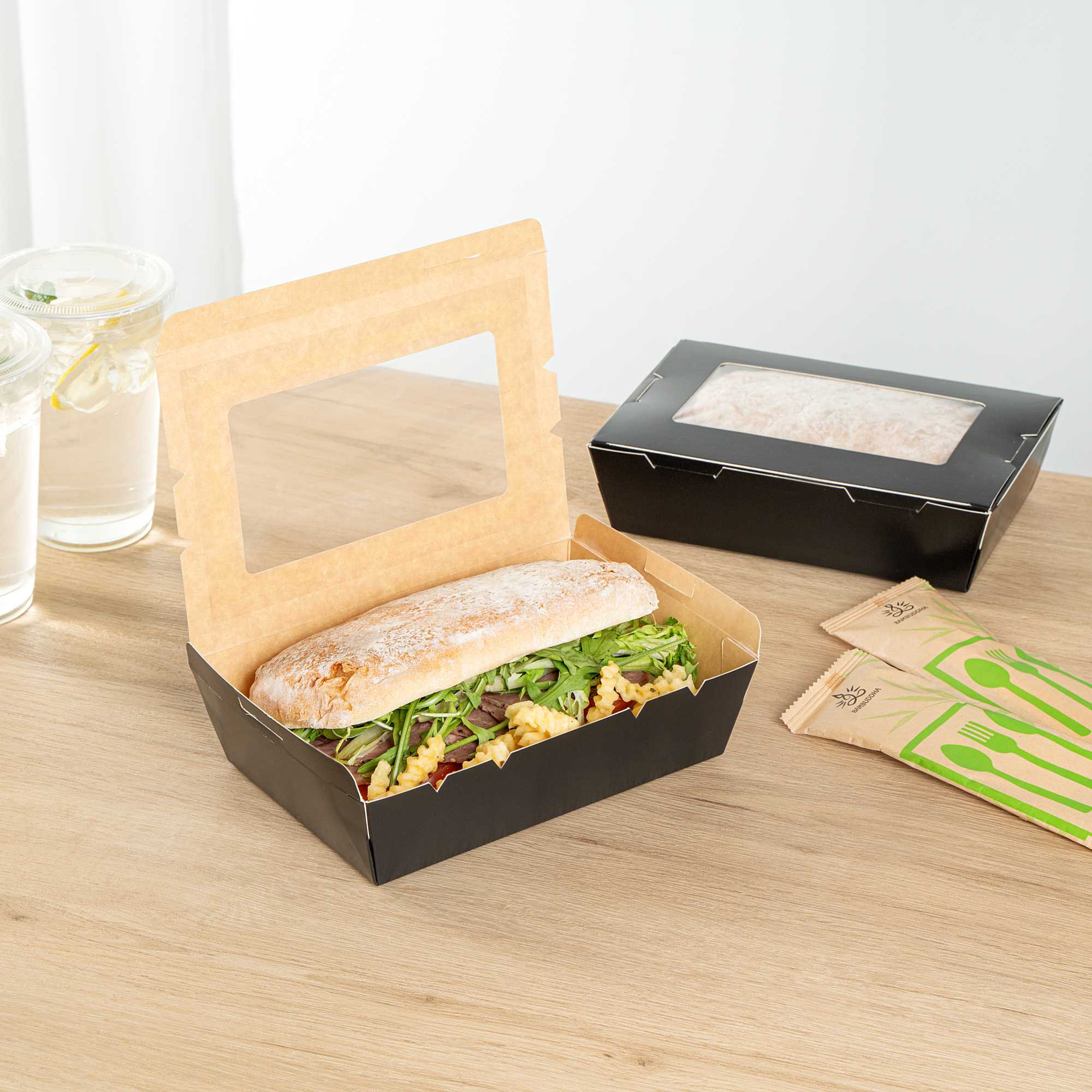 Cafe Vision 42 oz Black Paper Medium Take Out Container - Hinge Lock - 8" x 5 1/2" x 2" - 50 count box