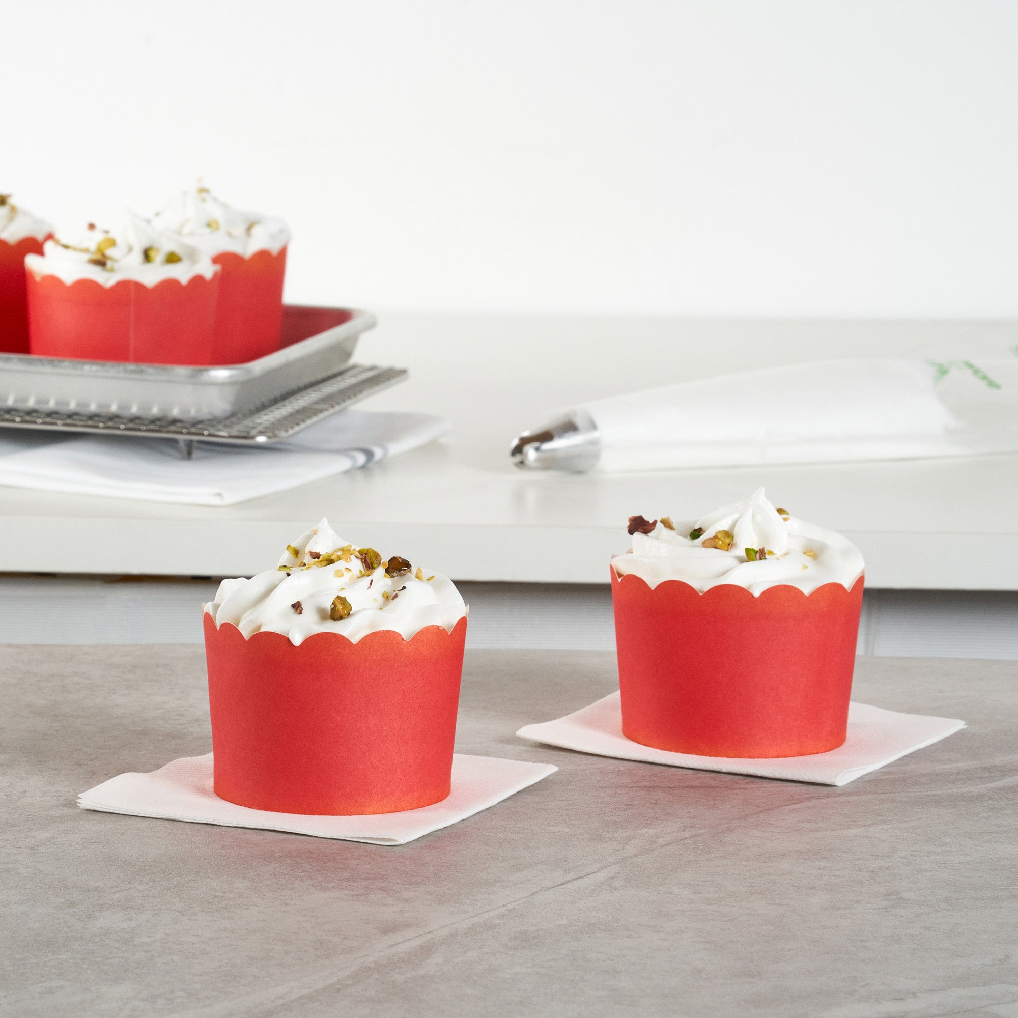 Panificio 10 oz Round Red Paper Jumbo Baking Cup - Scalloped - 3 1/2" x 3 1/2" x 2 1/2" - 200 count box