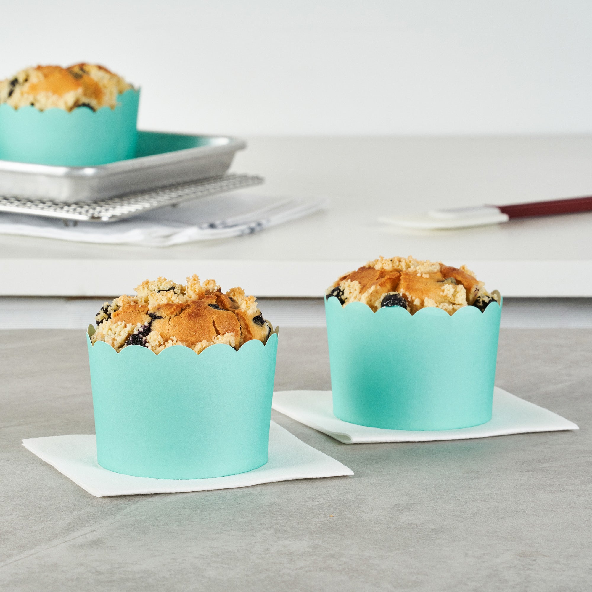 Panificio 10 oz Round Turquoise Paper Jumbo Baking Cup - Scalloped - 3 1/2" x 3 1/2" x 2 1/2" - 200 count box