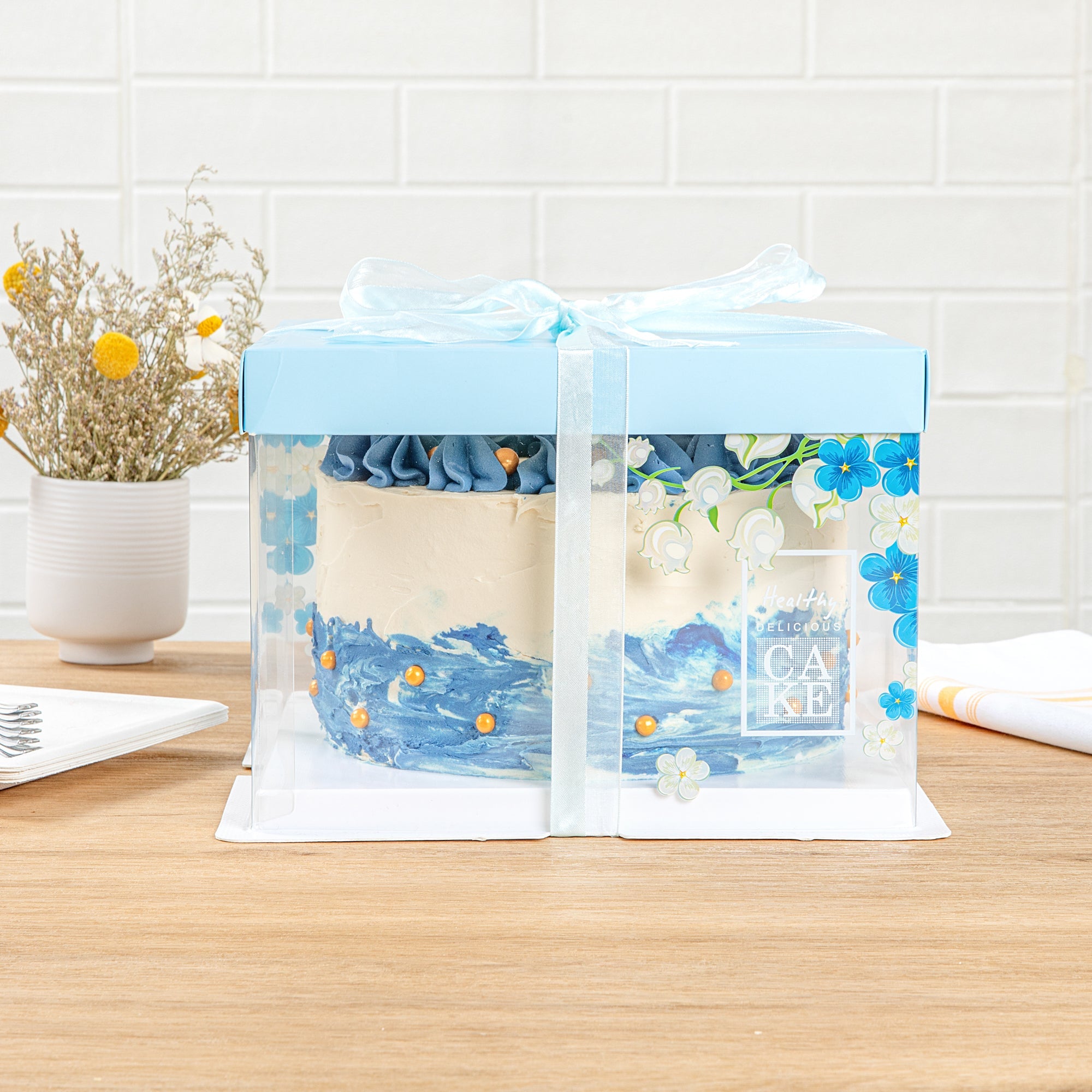 Sweet Vision Square Clear Plastic Cake Box - Blue Lid and White Base, Blue Ribbon, Flower Accent - 8 1/2" x 8 1/2" x 6 3/4" - 10 count box