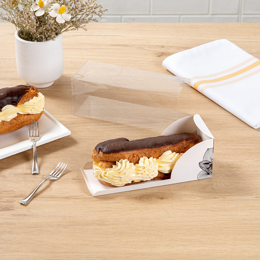 Sweet Vision Rectangle Clear Plastic Eclair Box - White Paper Sleeve, Lotus Accent - 7" x 2 1/2" x 2 1/2" - 100 count box