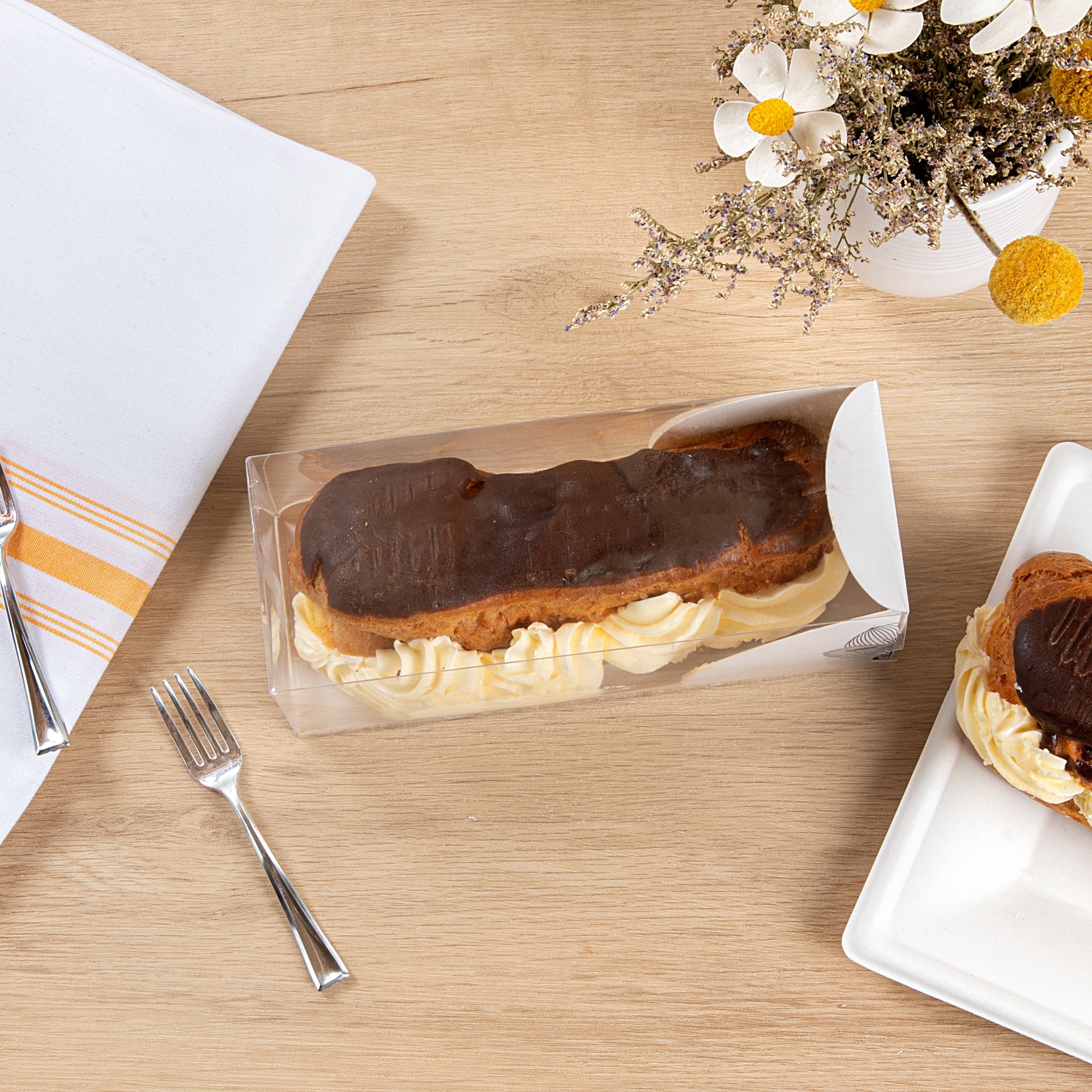 Sweet Vision Rectangle Clear Plastic Eclair Box - White Paper Sleeve, Lotus Accent - 7" x 2 1/2" x 2 1/2" - 100 count box