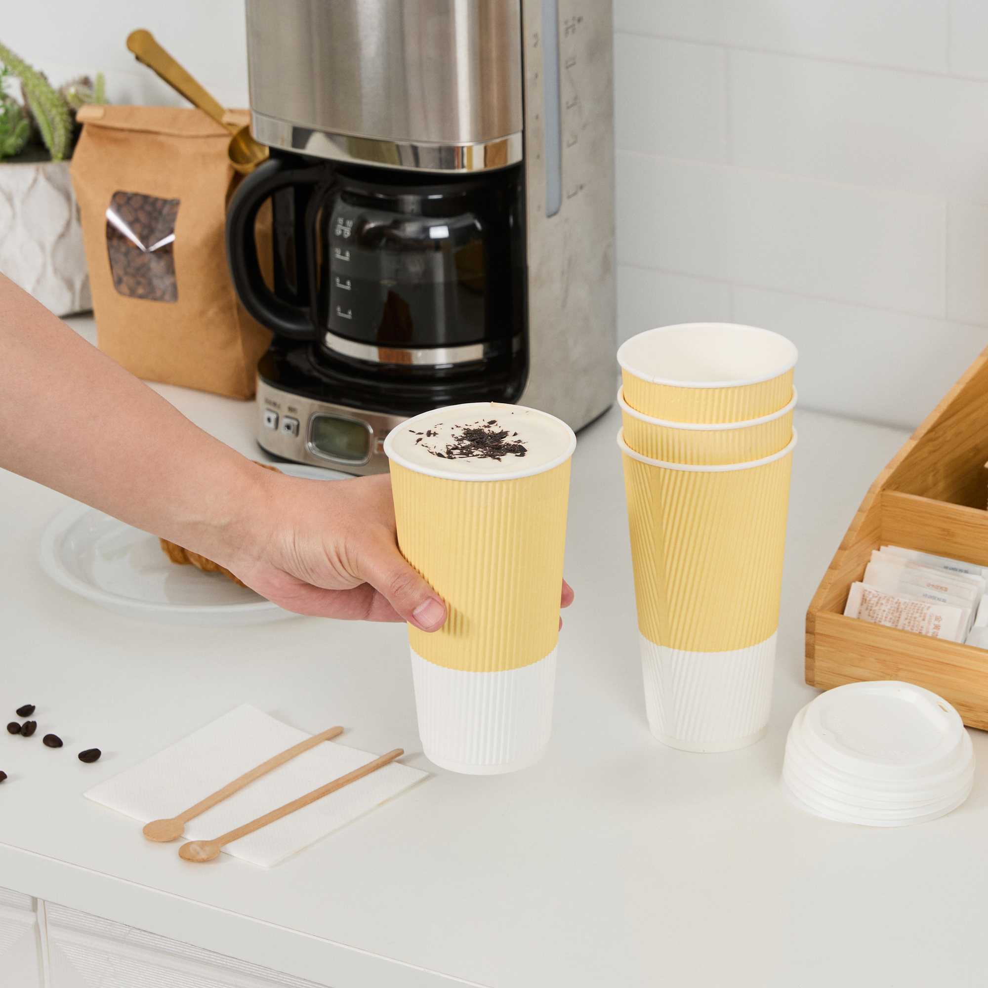 Restpresso 20 oz Light Yellow Paper Coffee Cup - Ripple Wall - 3 1/2" x 3 1/2" x 6 1/4" - 10 count box