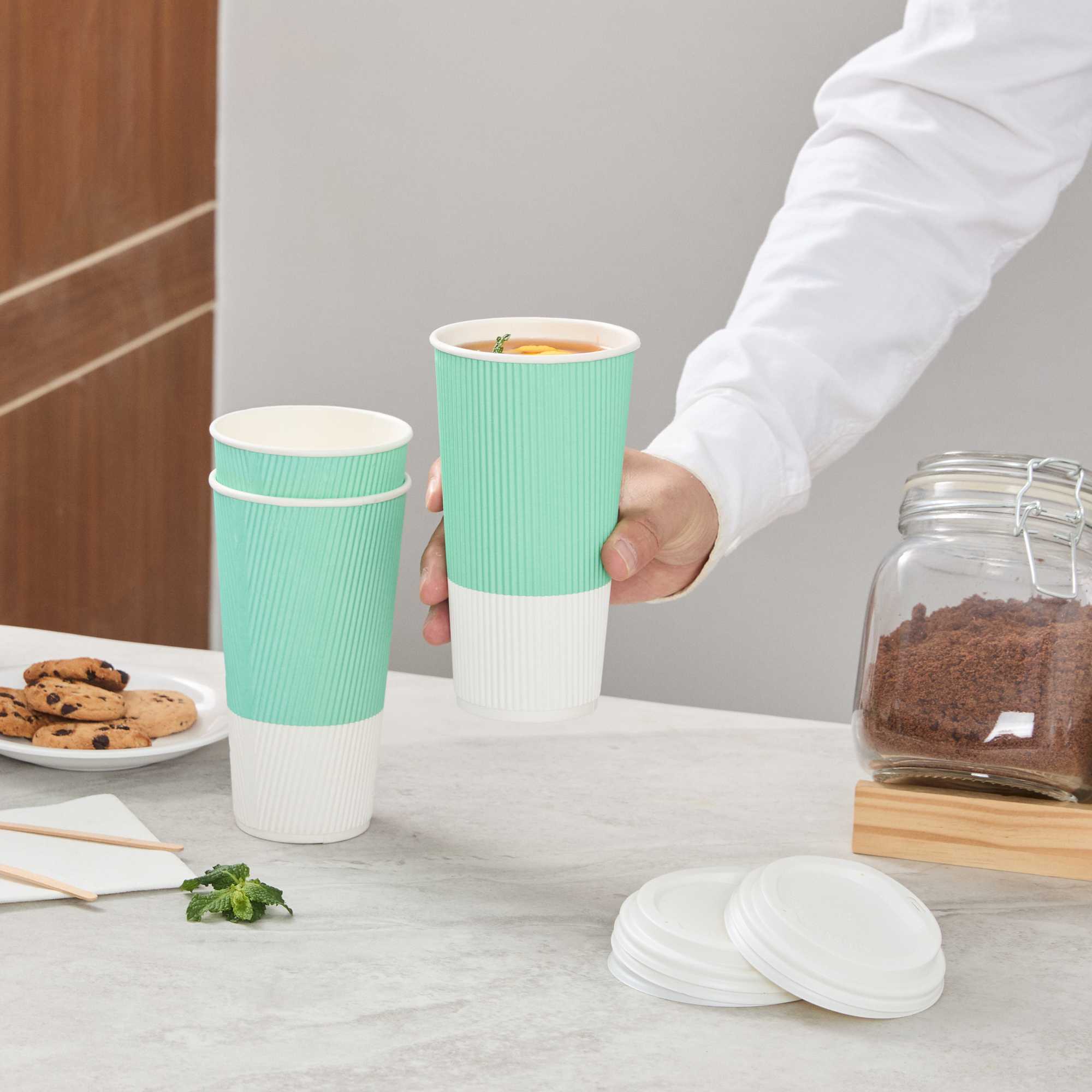 Restpresso 20 oz Light Green Paper Coffee Cup - Ripple Wall - 3 1/2" x 3 1/2" x 6 1/4" - 250 count box