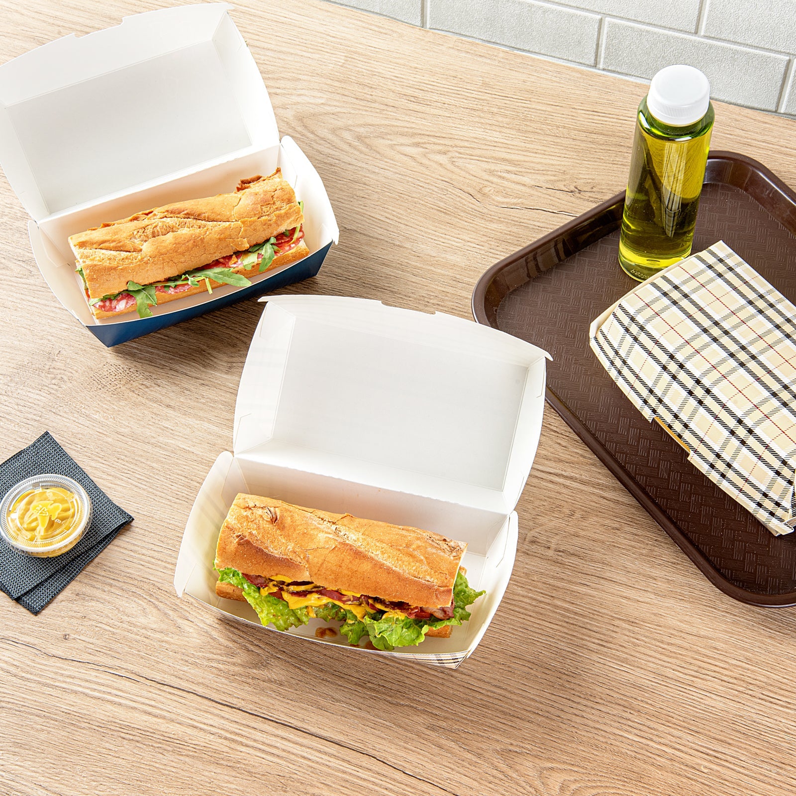 Bio Tek Rectangle Plaid Paper Hot Dog / Sandwich Clamshell Container - 6 3/4" x 3 1/2" x 3 1/2" - 100 count box
