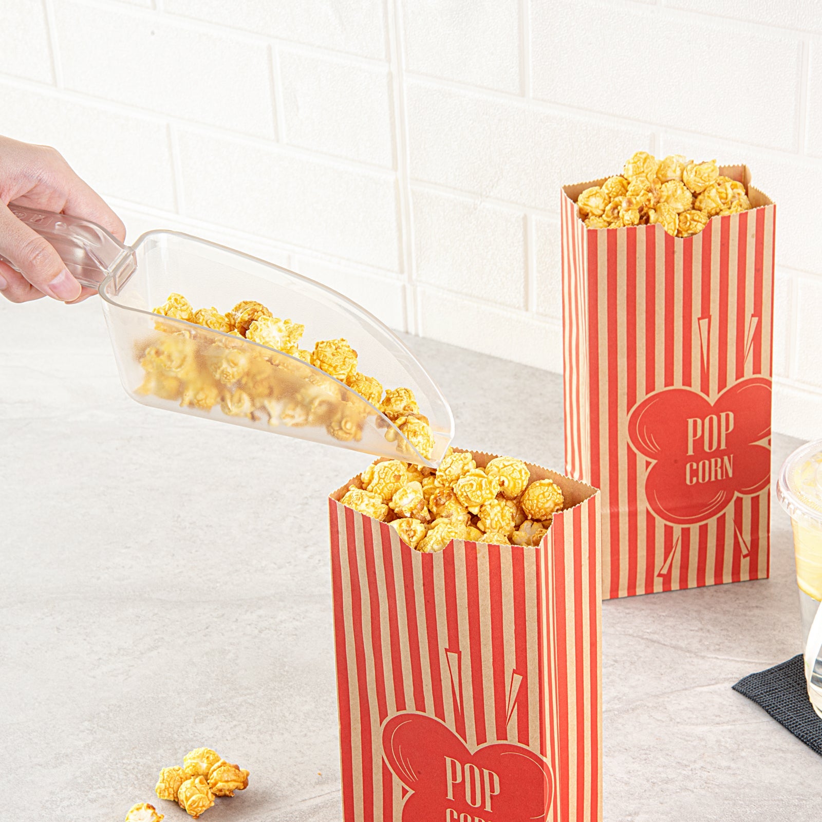 Bag Tek 2 oz Red and Kraft Paper Popcorn Bag - 5 1/4" x 3" x 10" - 100 count box