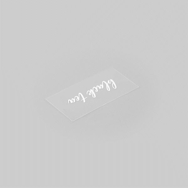 Label Tek Plastic Black Tea Label - Clear with White Font, Water-Resistant - 2" x 1" - 100 count box