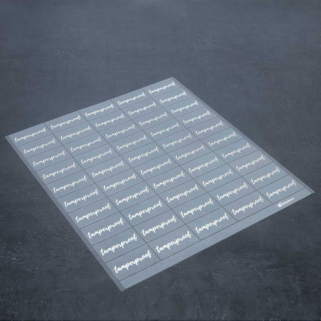 Label Tek Plastic Tamperproof Label - Clear with White Font, Water-Resistant - 2" x 1" - 100 count box