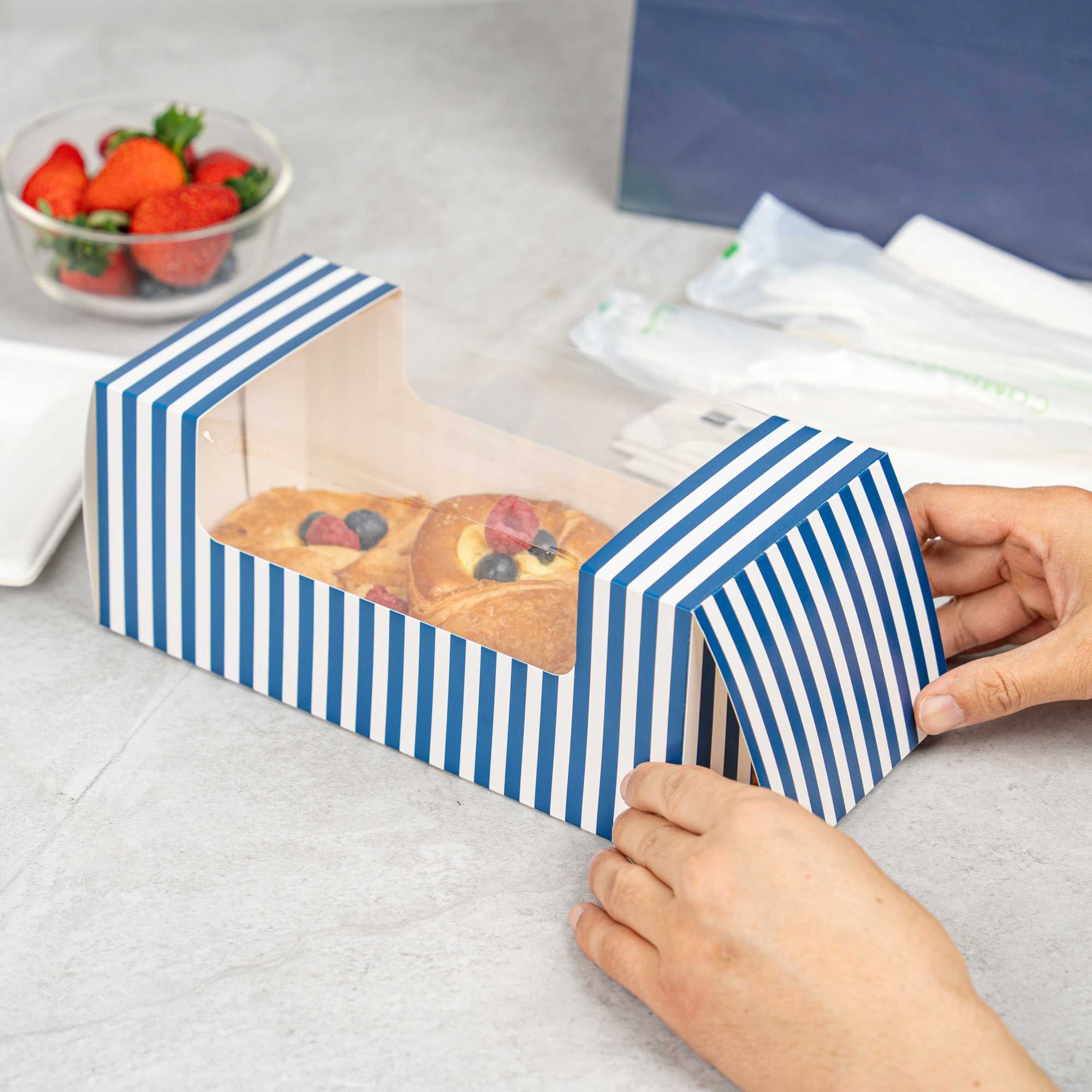 Pastry Tek Blue and White Stripe Paper Pastry / Cake Box - with Window - 9 3/4" x 4 3/4" x 4" - 100 count box