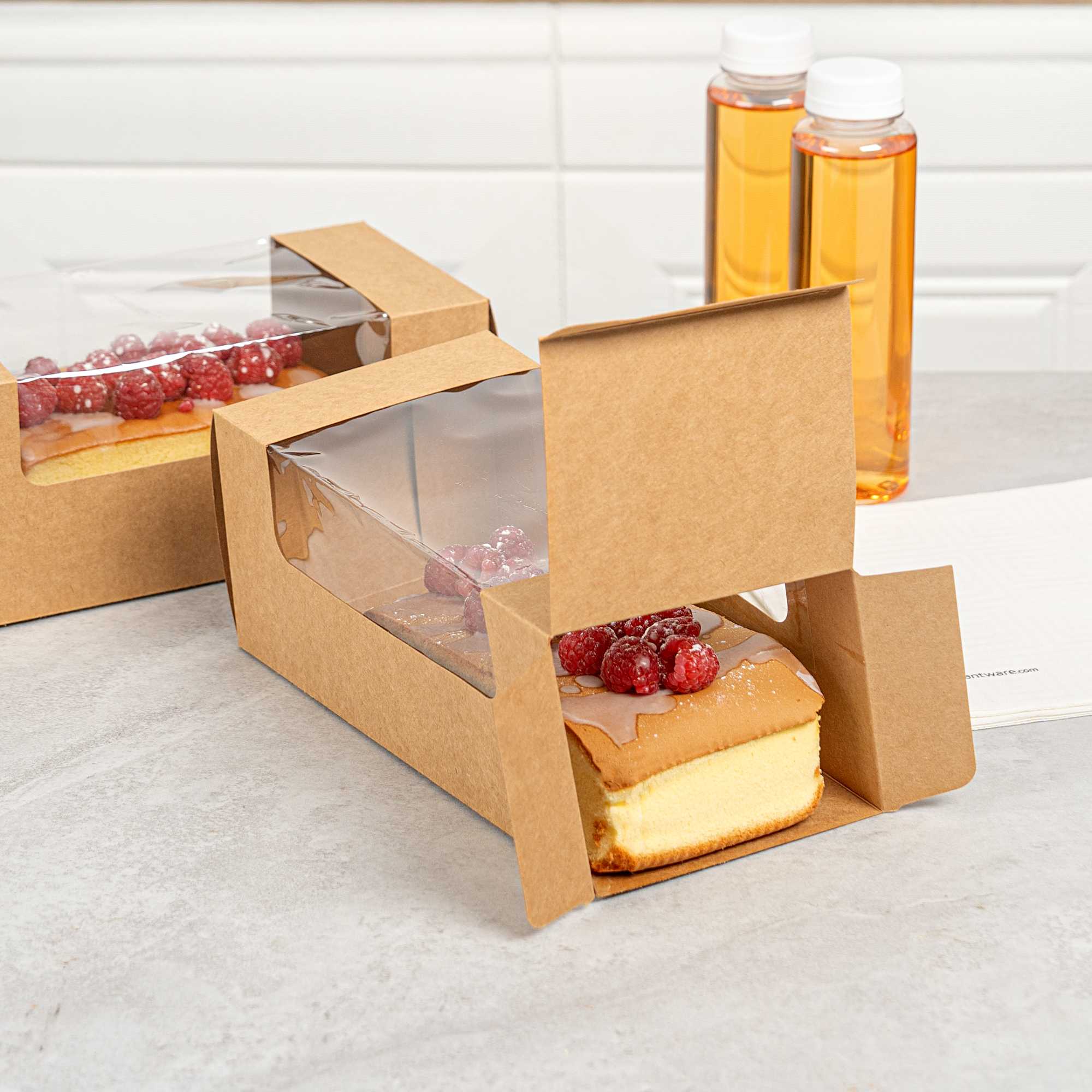 Pastry Tek Kraft Paper Pastry / Cake Box - with Window - 9 3/4" x 4 3/4" x 4" - 100 count box