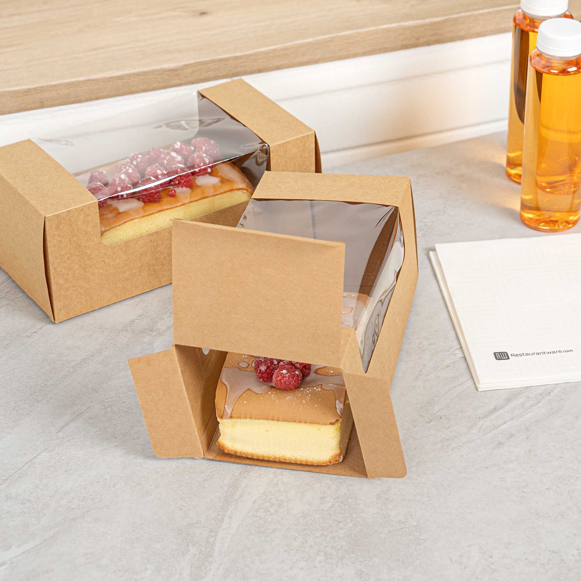 Pastry Tek Kraft Paper Pastry / Cake Box - with Window - 9 3/4" x 4 3/4" x 4" - 100 count box