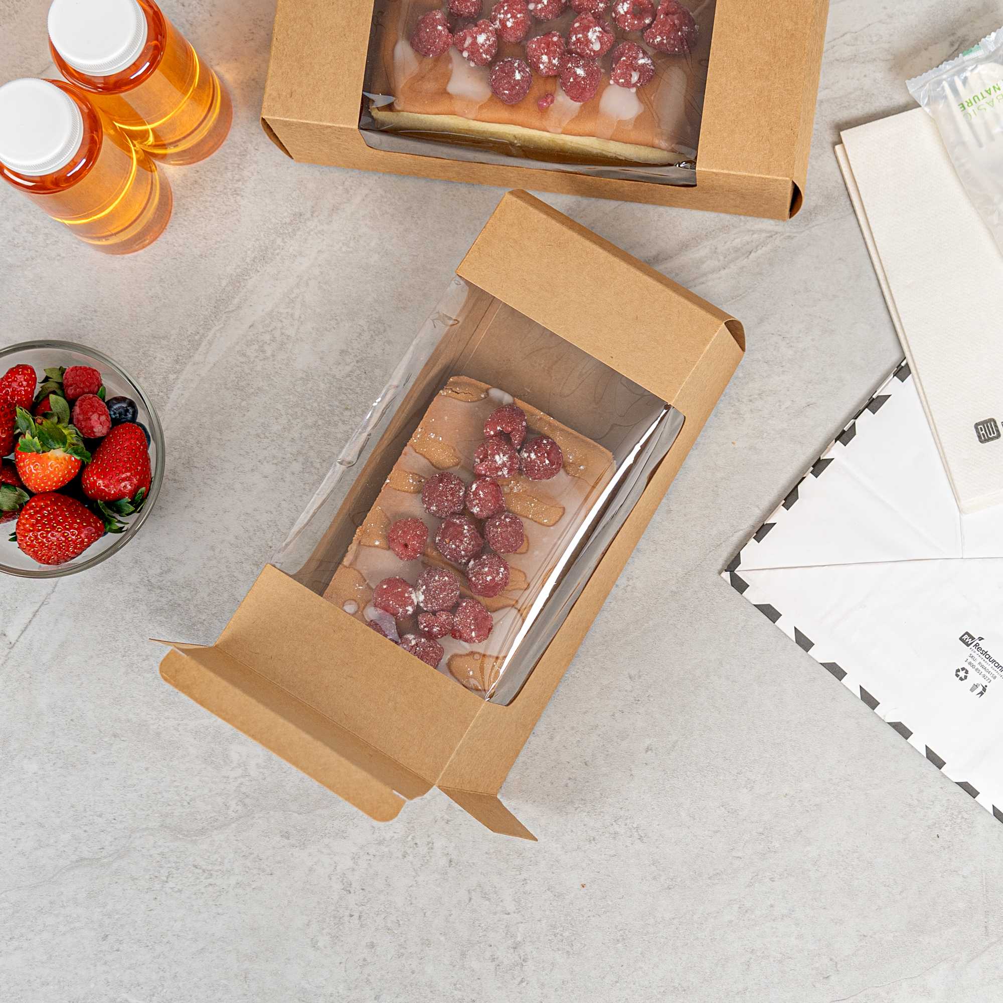 Pastry Tek Kraft Paper Pastry / Cake Box - with Window - 9 3/4" x 4 3/4" x 4" - 100 count box
