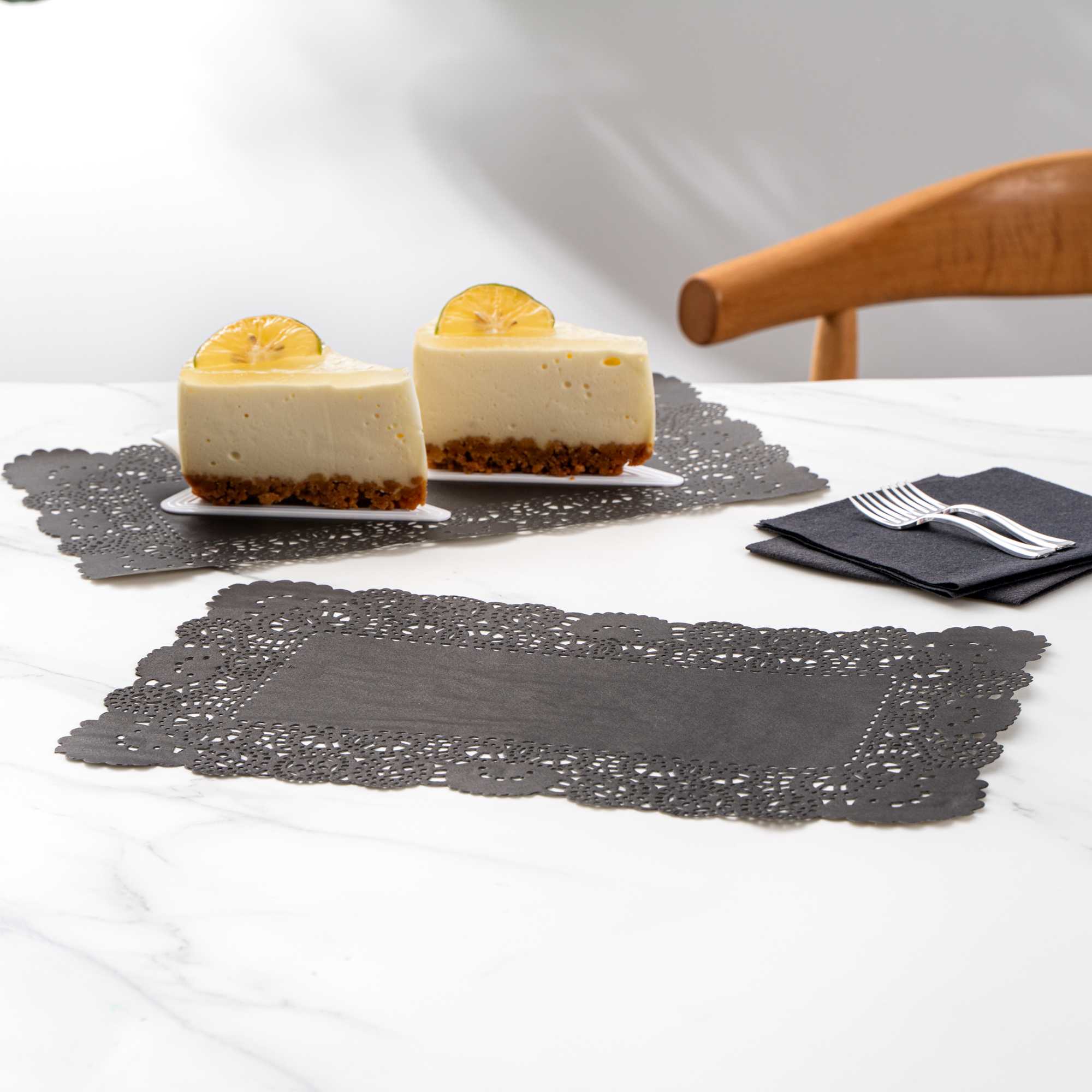 Pastry Tek Rectangle Black Paper Doilies - Lace - 12" x 7" - 4000 count box