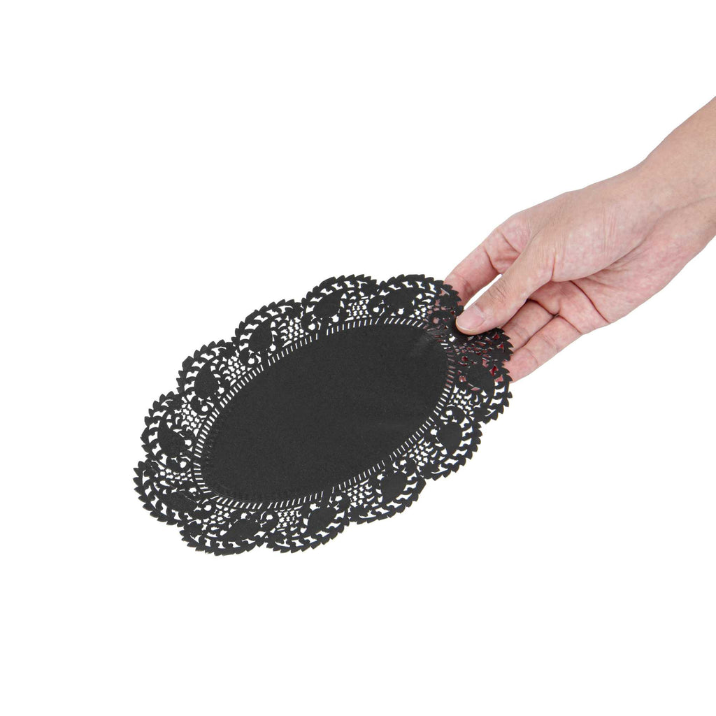Pastry Tek Oval Black Paper Doilies - Lace - 9" x 6 1/2" - 100 count box