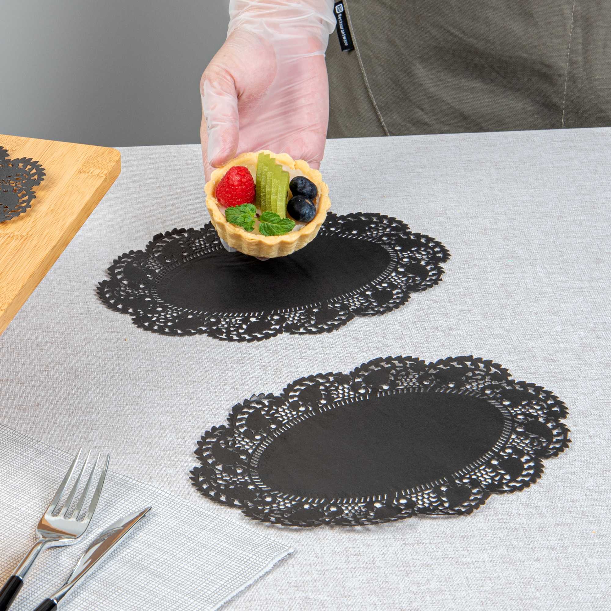 Pastry Tek Oval Black Paper Doilies - Lace - 9" x 6 1/2" - 100 count box