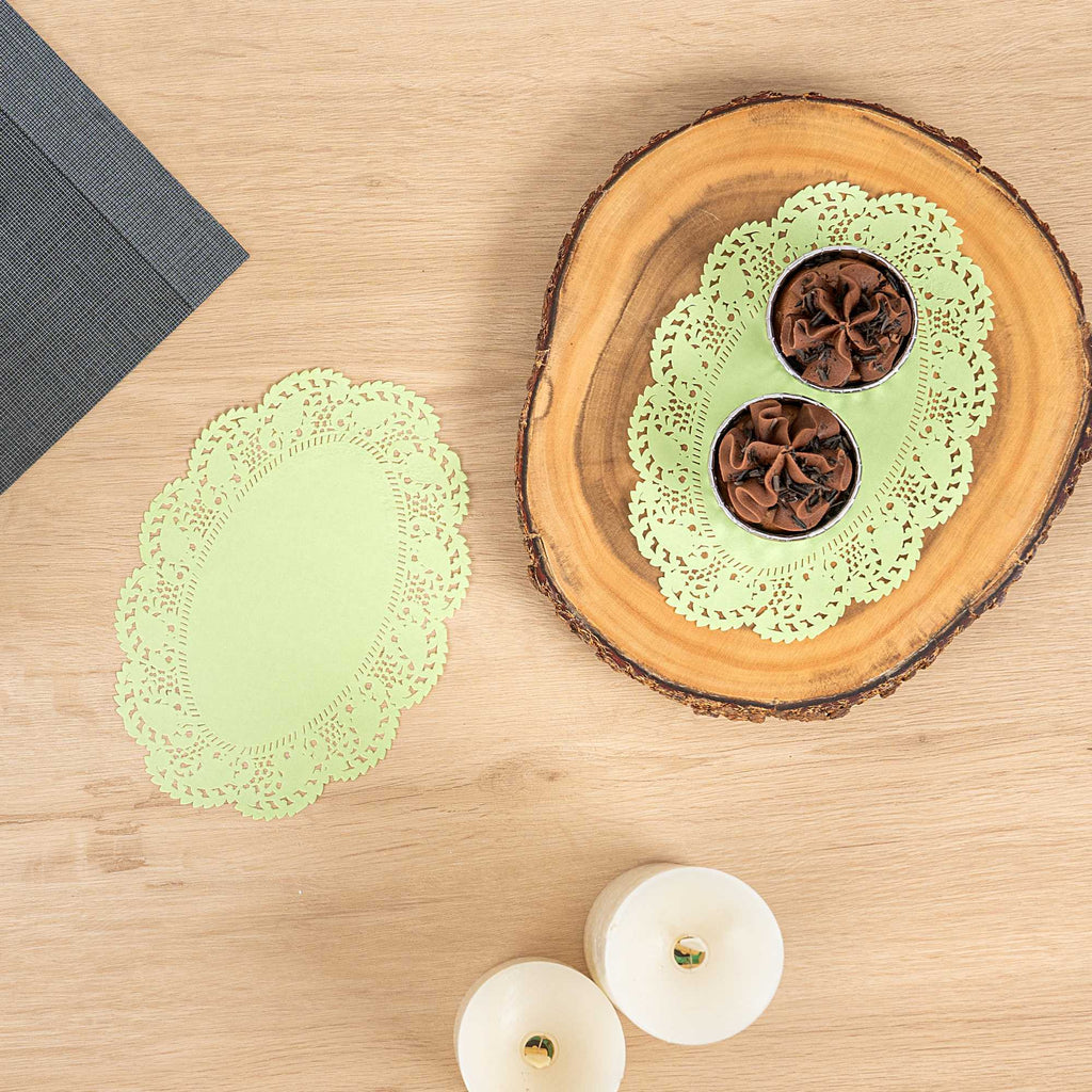Pastry Tek Oval Green Paper Doilies - Lace - 9" x 6 1/2" - 100 count box