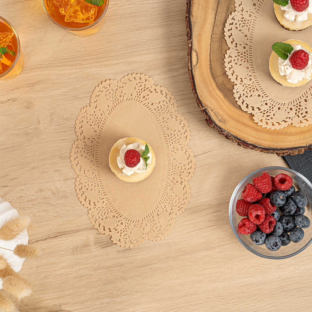 Pastry Tek Oval Kraft Paper Doilies - Lace - 9" x 6 1/2" - 100 count box