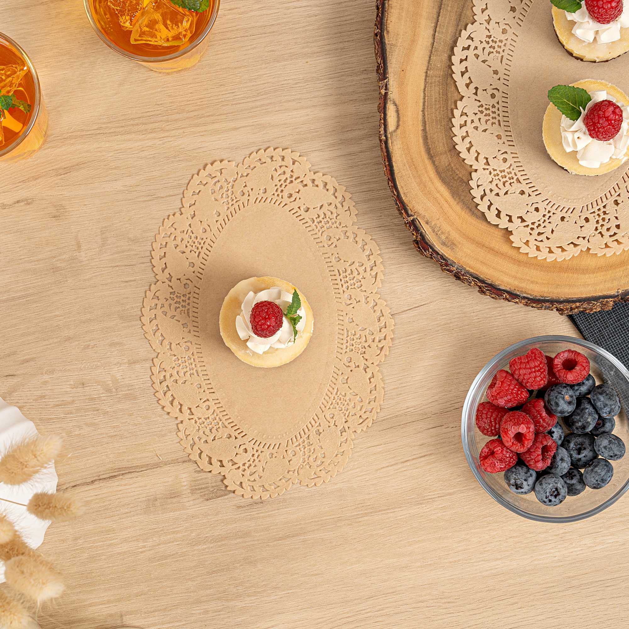 Pastry Tek Oval Kraft Paper Doilies - Lace - 9" x 6 1/2" - 100 count box