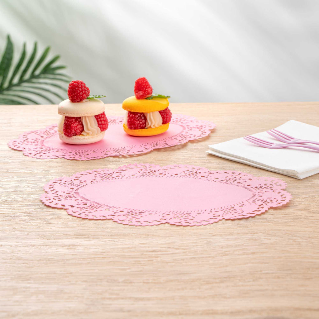 Pastry Tek Oval Pink Paper Doilies - Lace - 9" x 6 1/2" - 100 count box