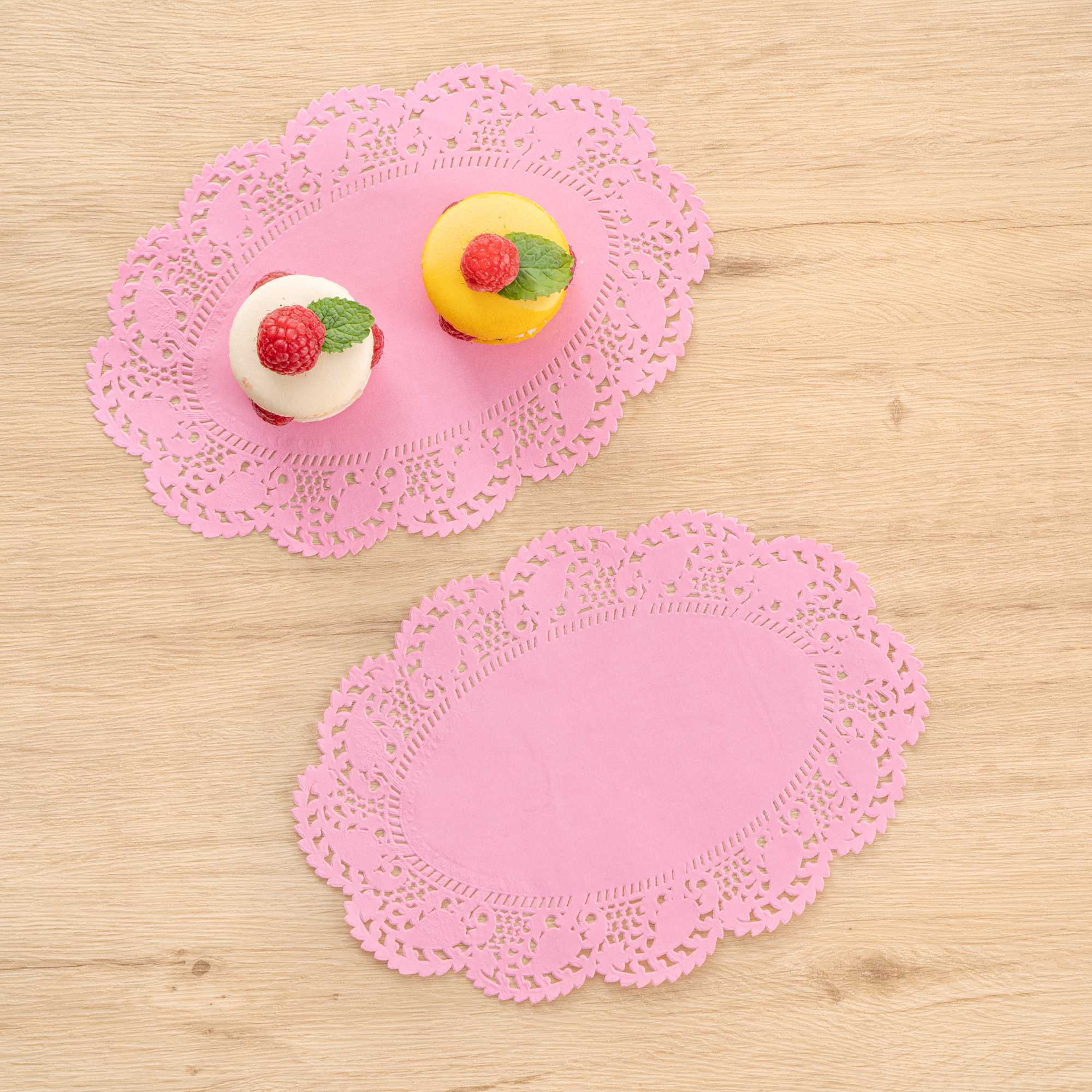 Pastry Tek Oval Pink Paper Doilies - Lace - 9" x 6 1/2" - 100 count box