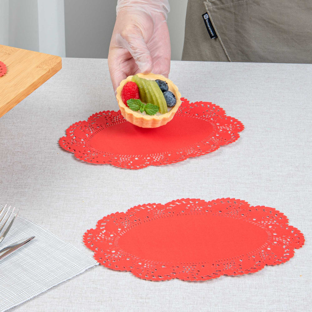 Pastry Tek Oval Red Paper Doilies - Lace - 9" x 6 1/2" - 4000 count box