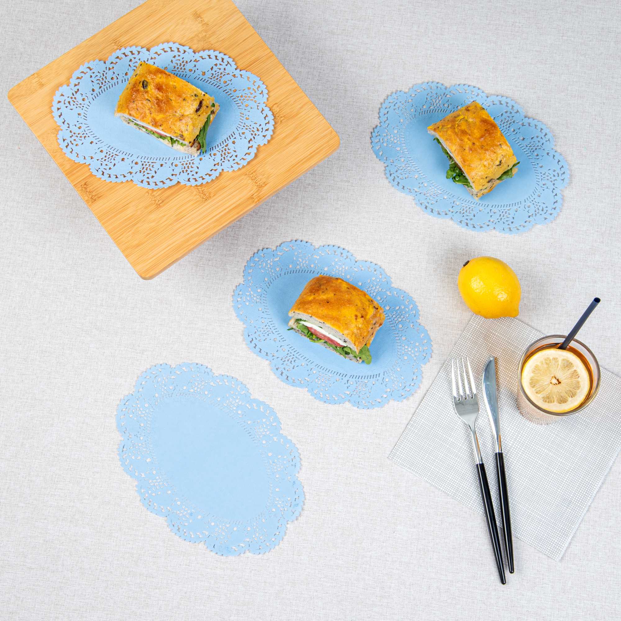 Pastry Tek Oval Sky Blue Paper Doilies - Lace - 9" x 6 1/2" - 4000 count box