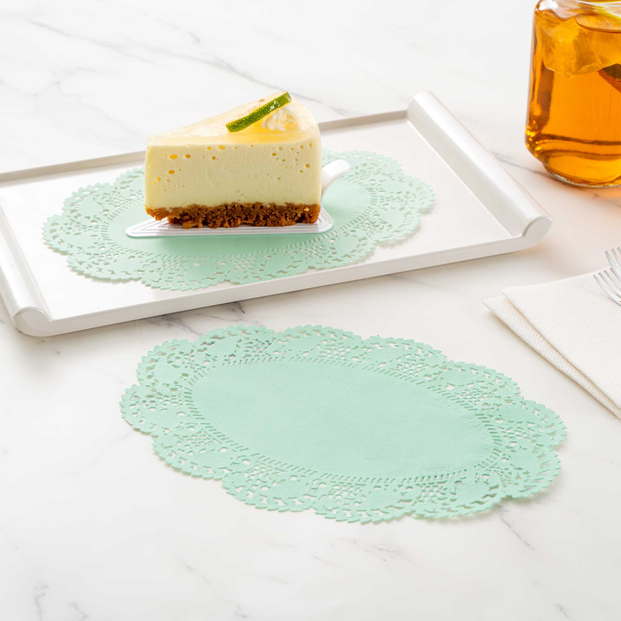 Pastry Tek Oval Teal Paper Doilies - Lace - 9" x 6 1/2" - 100 count box