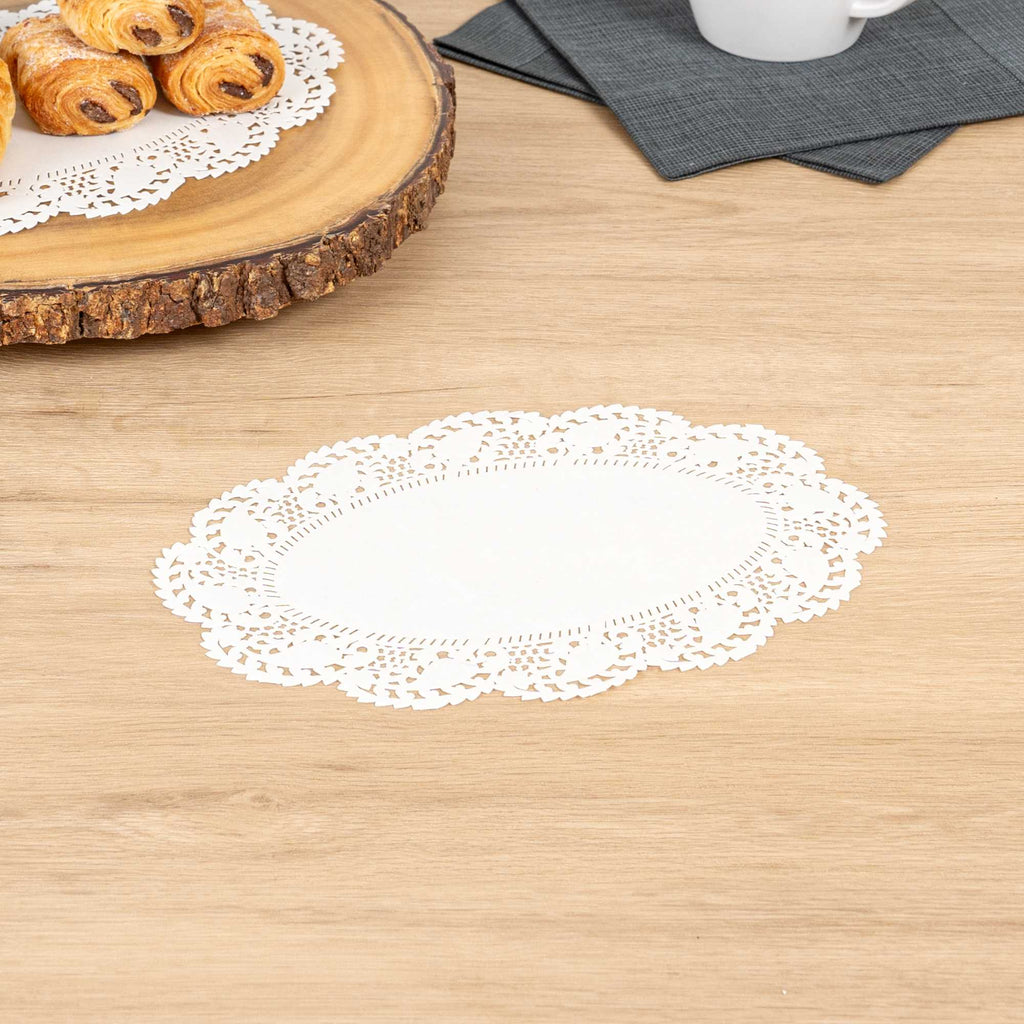 Pastry Tek Oval White Paper Doilies - Lace - 9" x 6 1/2" - 4000 count box