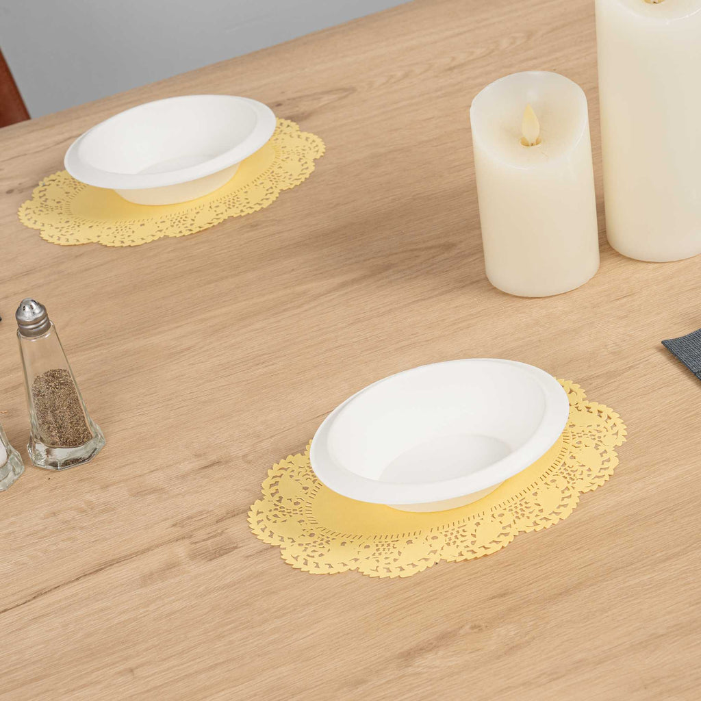 Pastry Tek Oval Yellow Paper Doilies - Lace - 9" x 6 1/2" - 100 count box