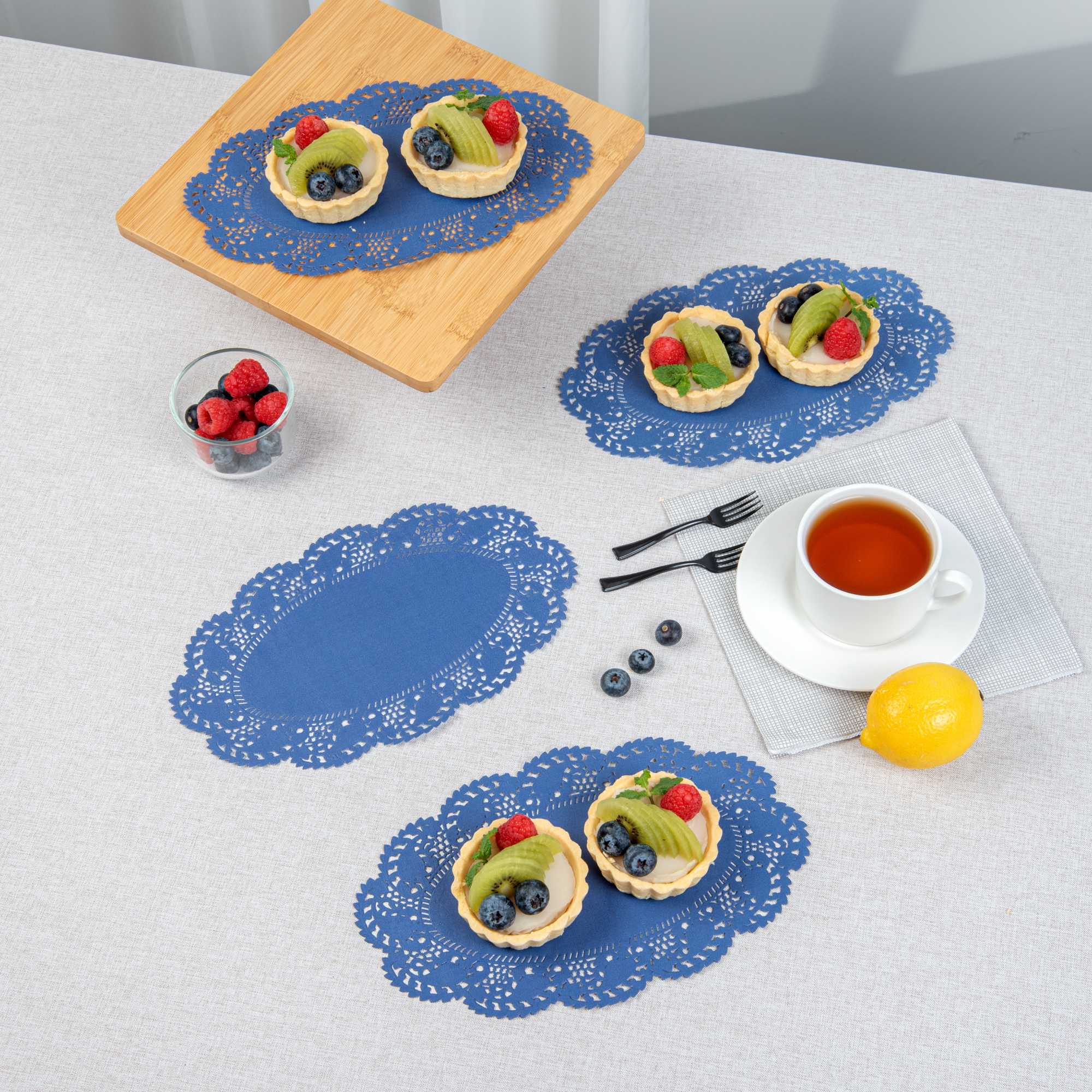 Pastry Tek Oval Navy Blue Paper Doilies - Lace - 10 1/2" x 6 1/2" - 100 count box