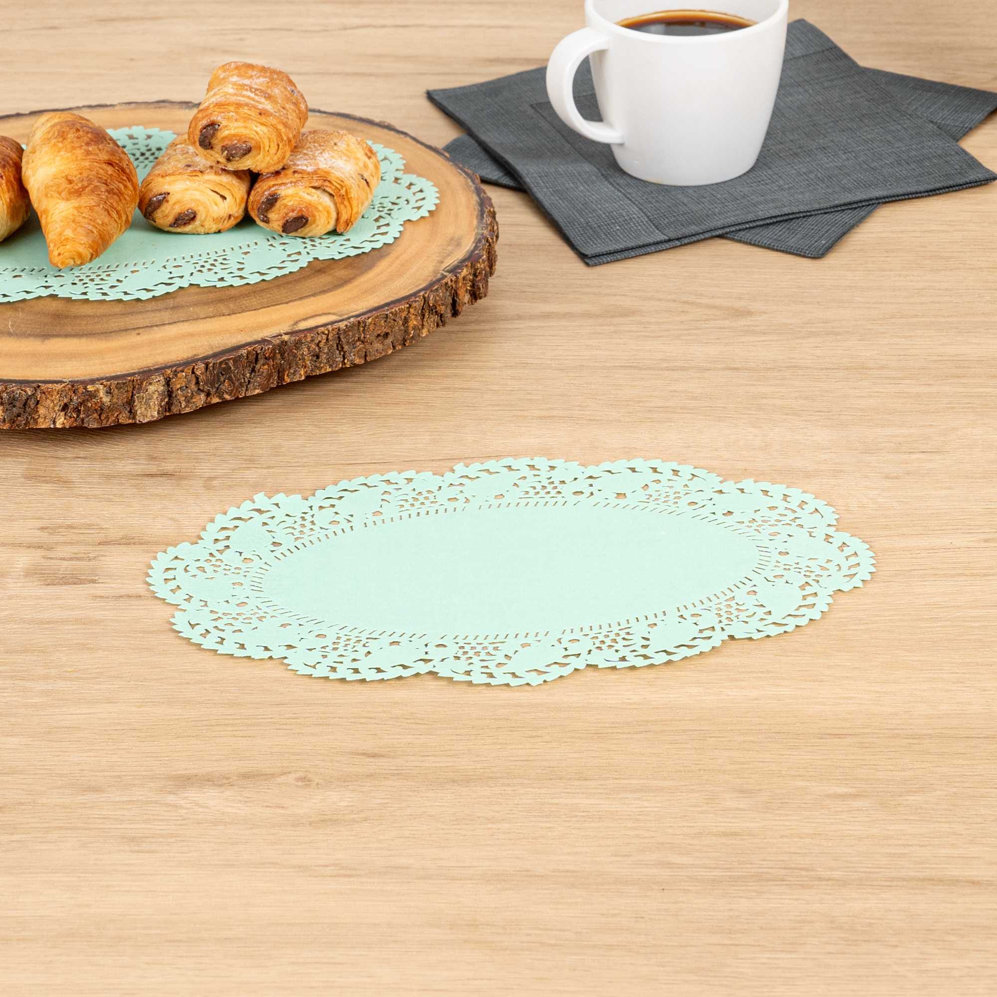 Pastry Tek Oval Teal Paper Doilies - Lace - 10 1/2" x 6 1/2" - 100 count box
