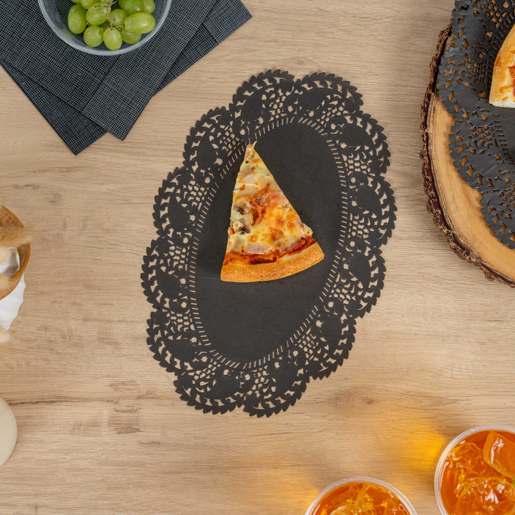 Pastry Tek Oval Black Paper Doilies - Lace - 12 1/2" x 8 1/2" - 100 count box