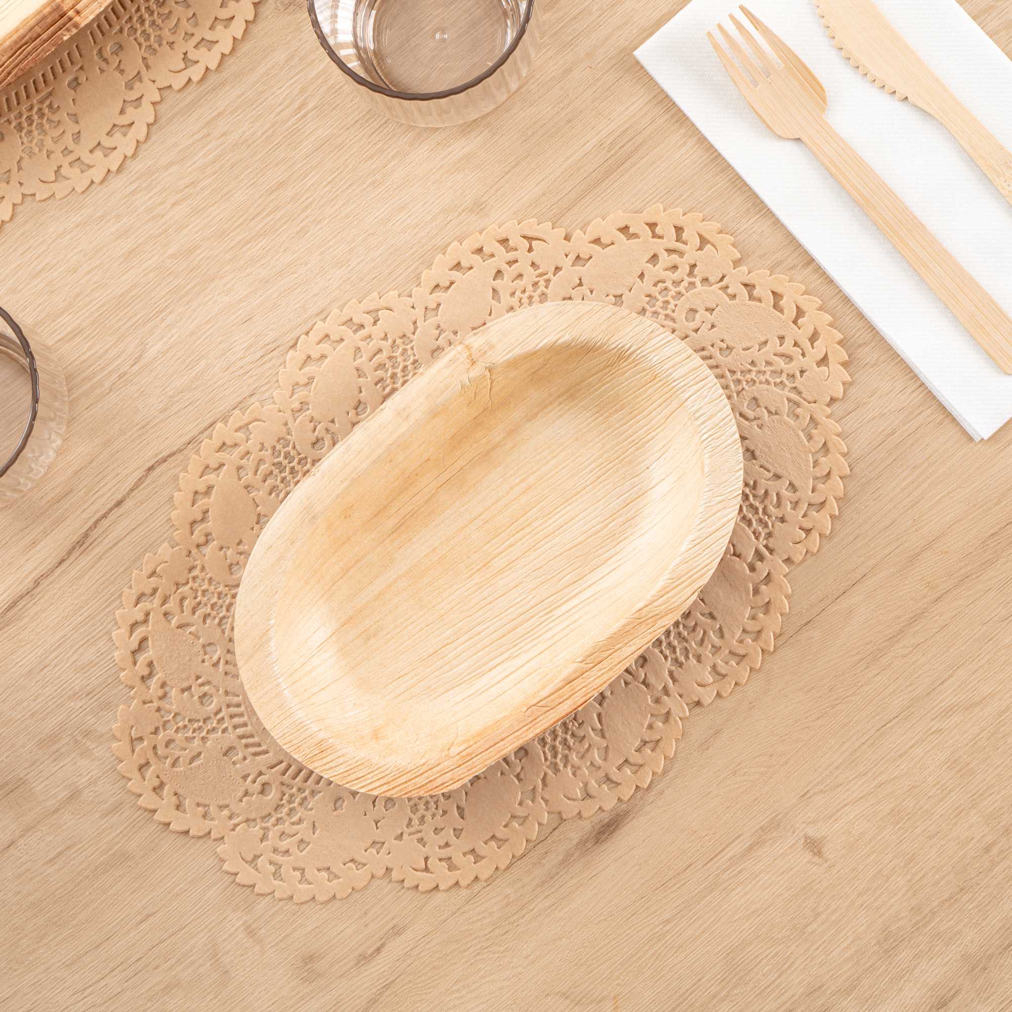 Pastry Tek Oval Kraft Paper Doilies - Lace - 12 1/2" x 8 1/2" - 100 count box