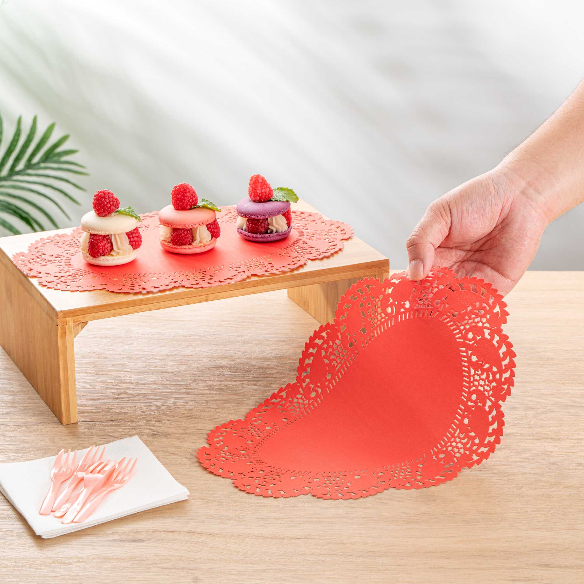 Pastry Tek Oval Red Paper Doilies - Lace - 12 1/2" x 8 1/2" - 100 count box